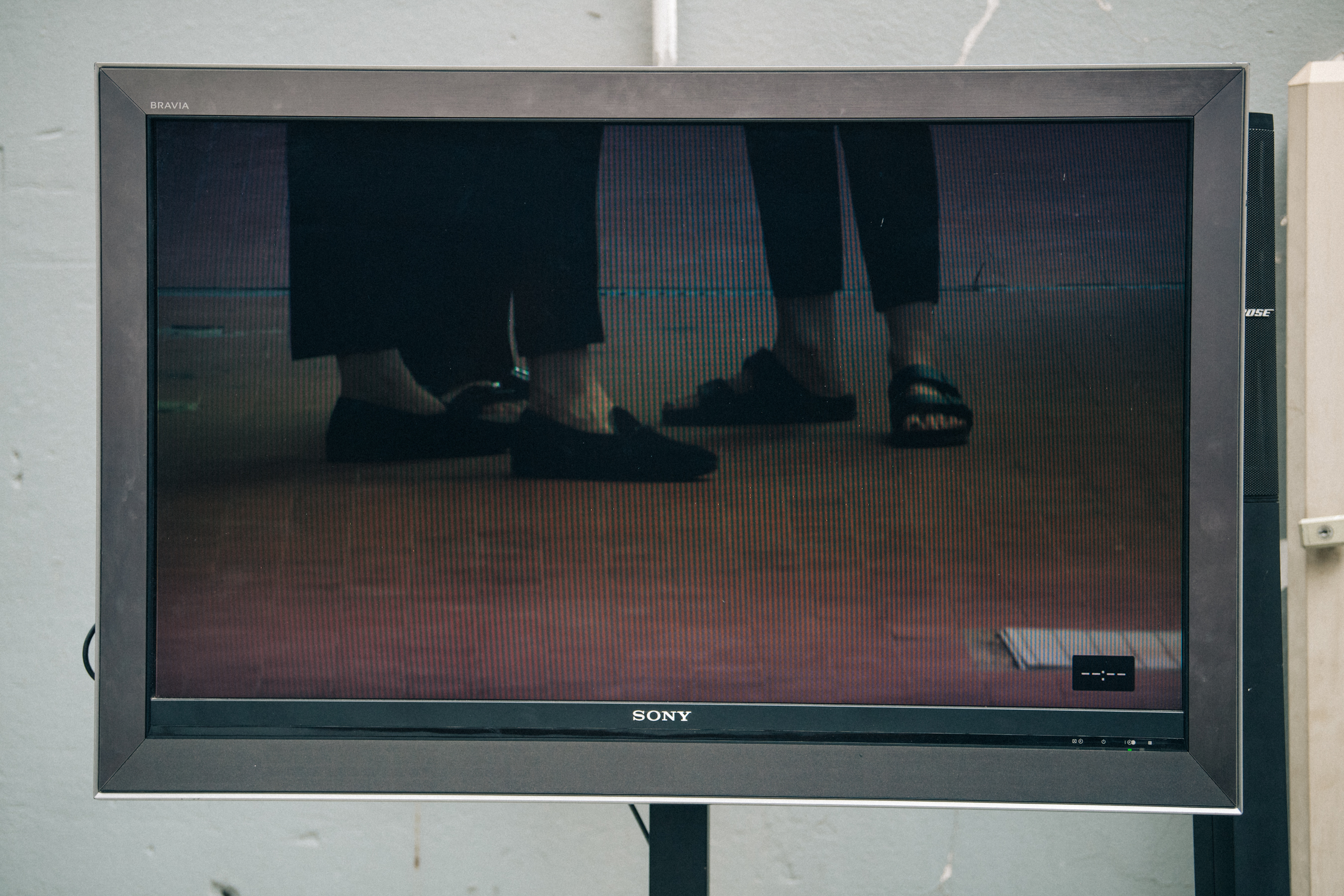 TV screen backstage at Jil Sander