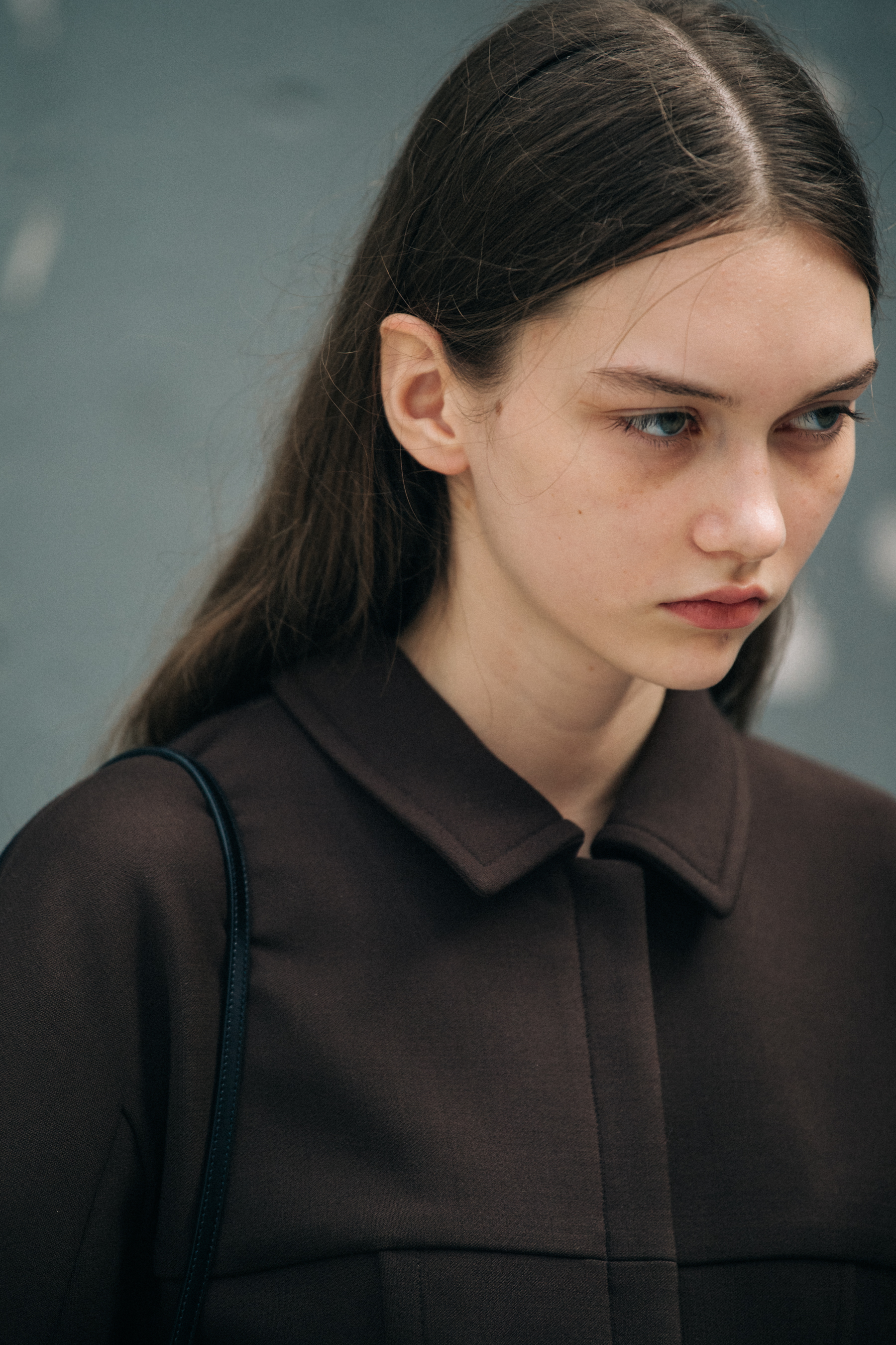 Model wearing brown Jil Sander outfit