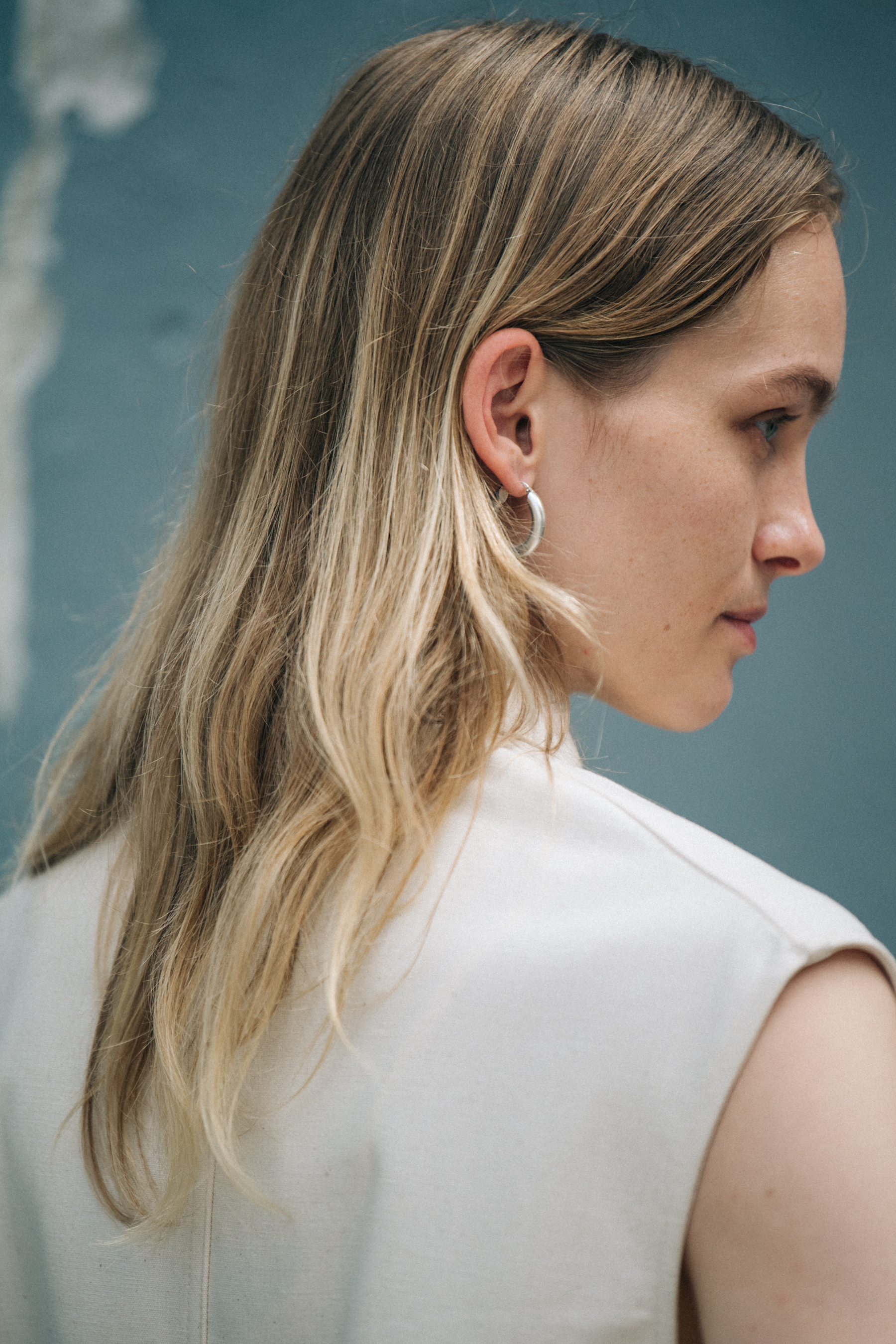 Model wearing white Jil Sander outfit