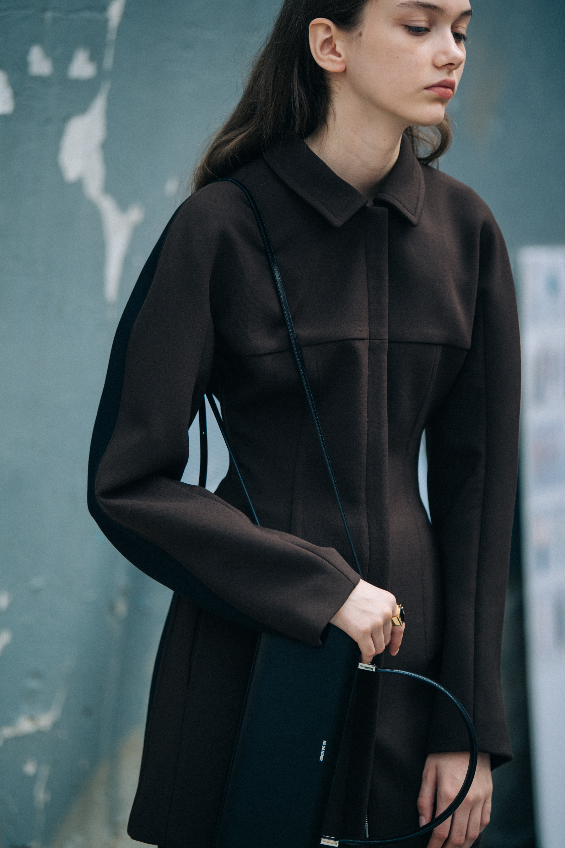 Model wearing brown Jil Sander outfit