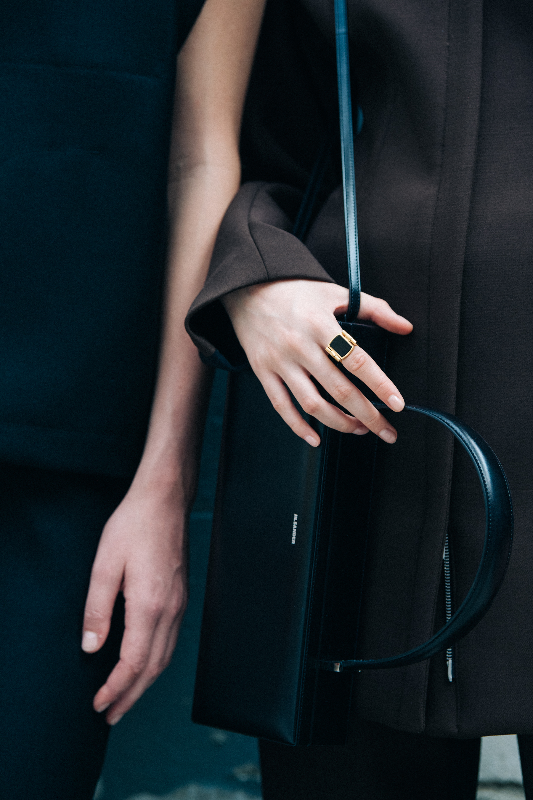 Model wearing brown Jil Sander outfit