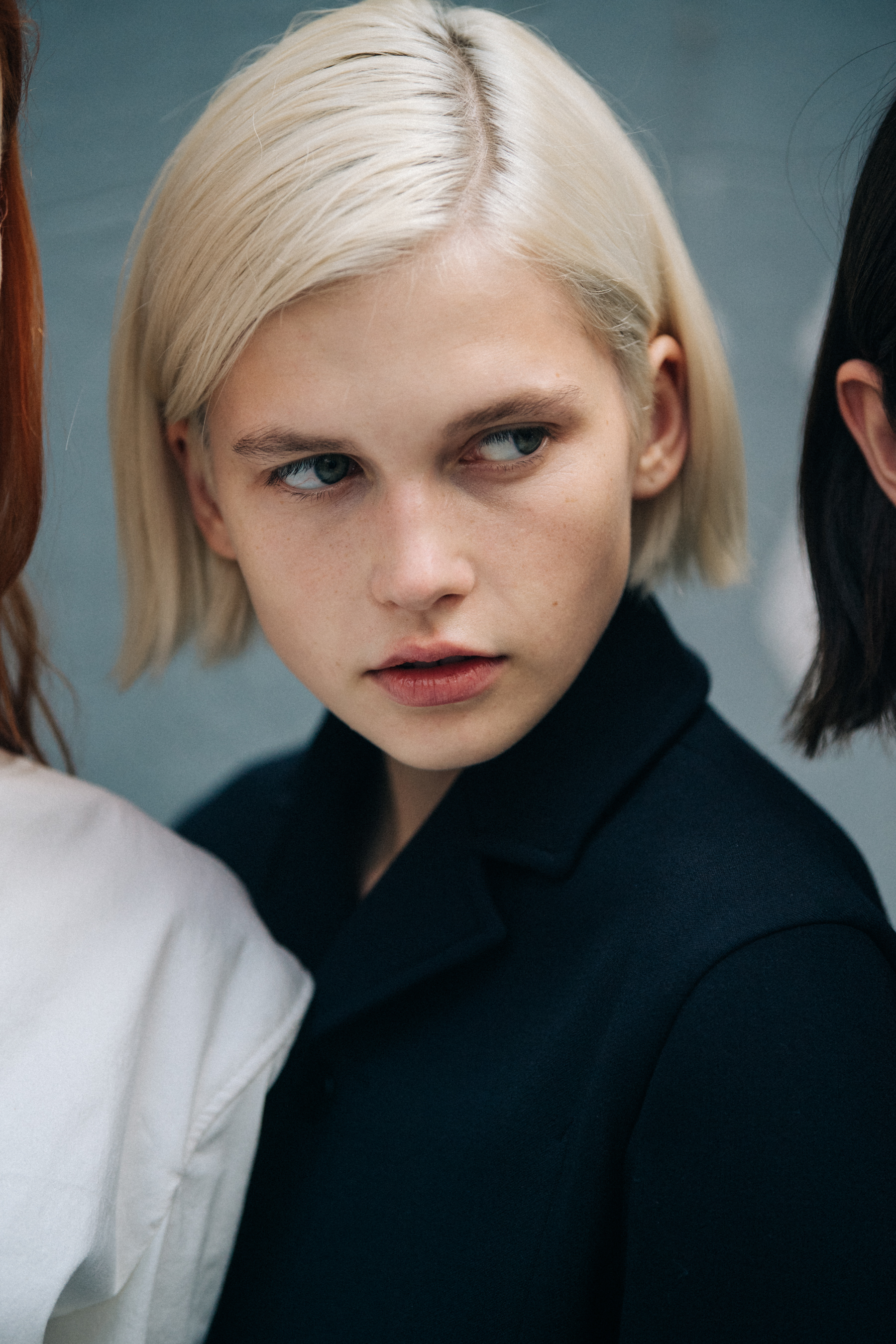 Model wearing blue Jil Sander outfit