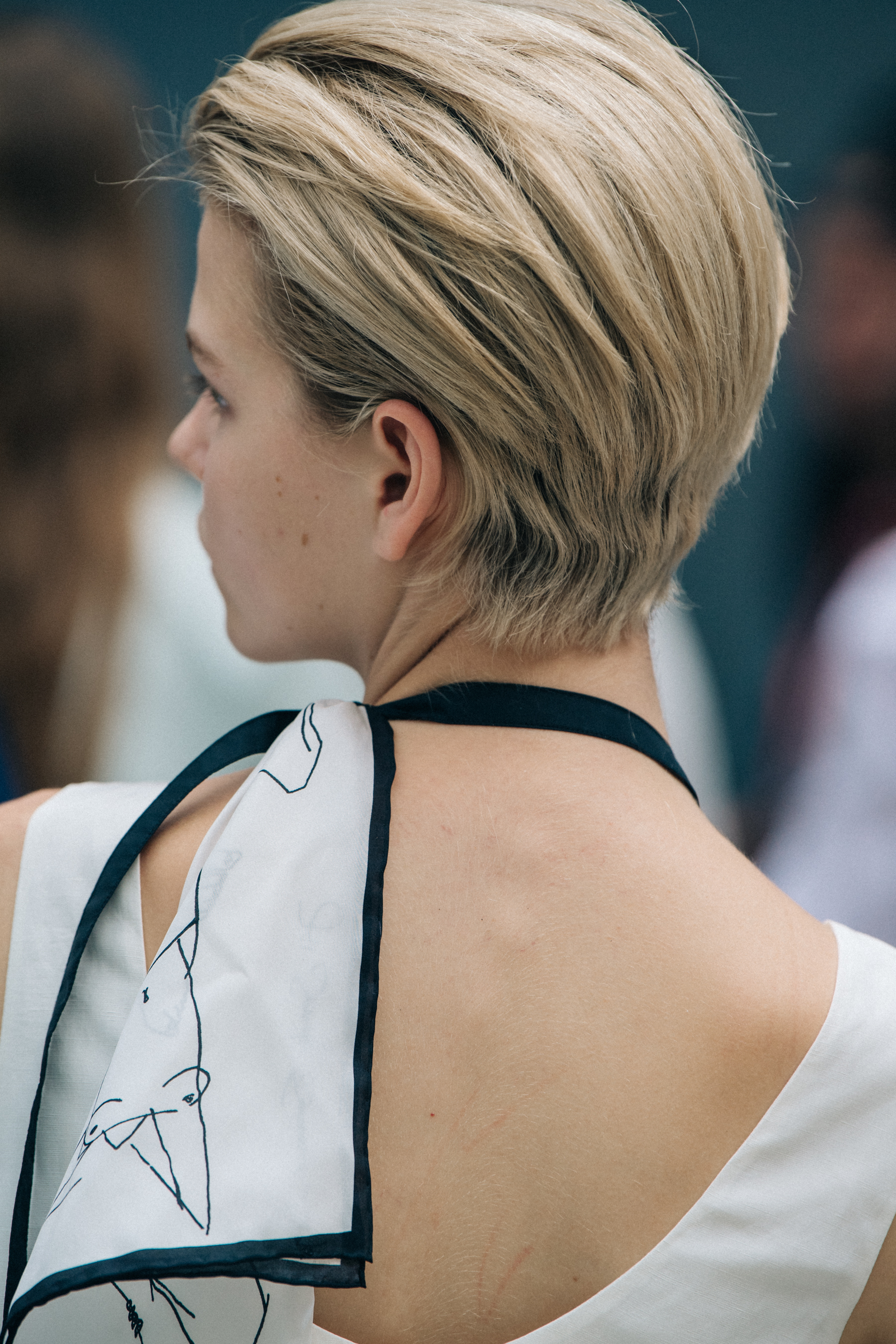 Model wearing white Jil Sander outfit