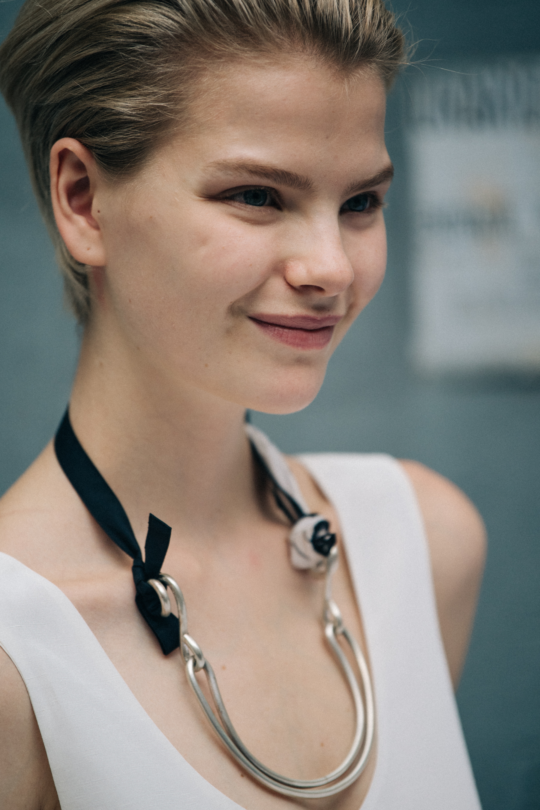 Model wearing white Jil Sander outfit