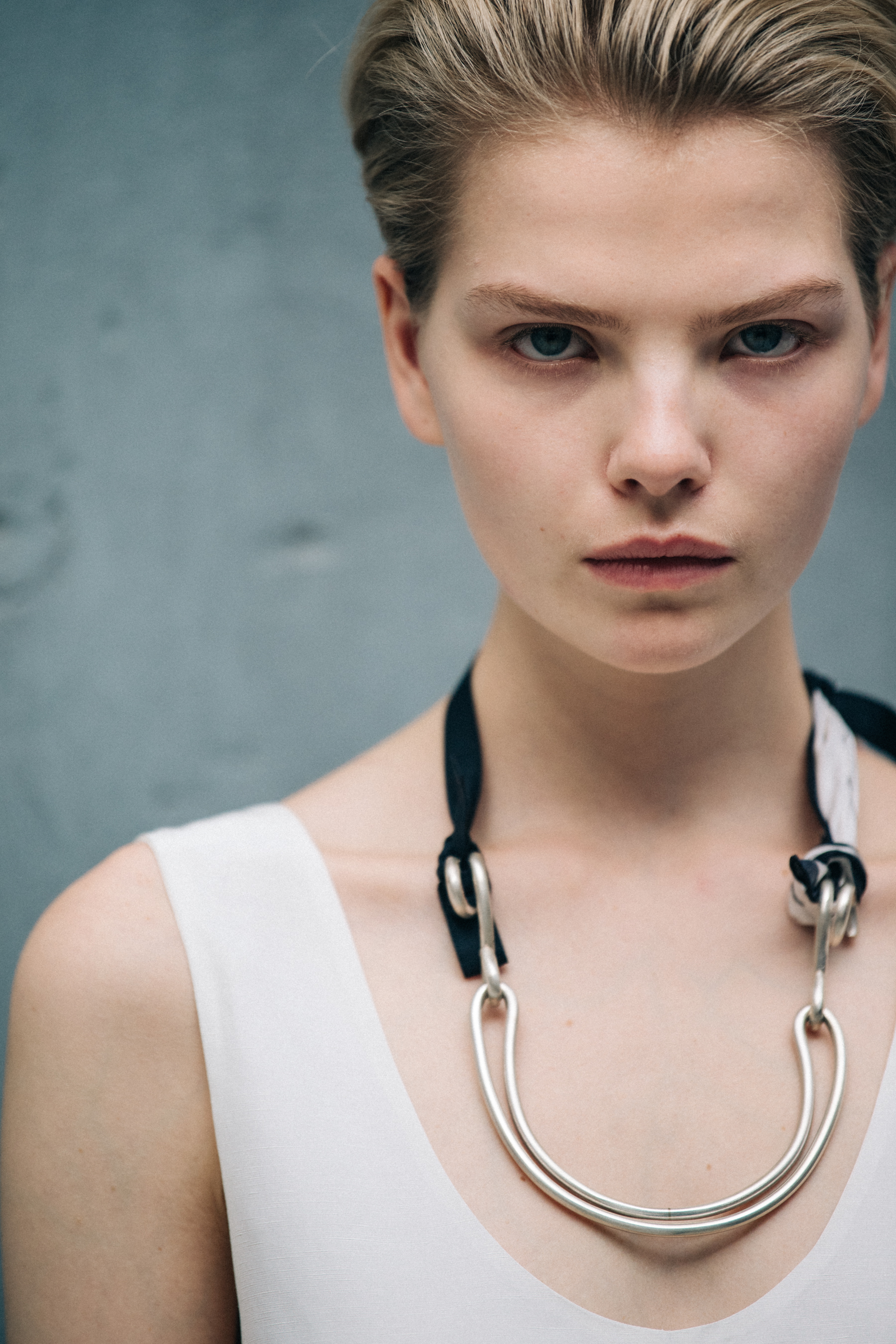 Model wearing white Jil Sander outfit