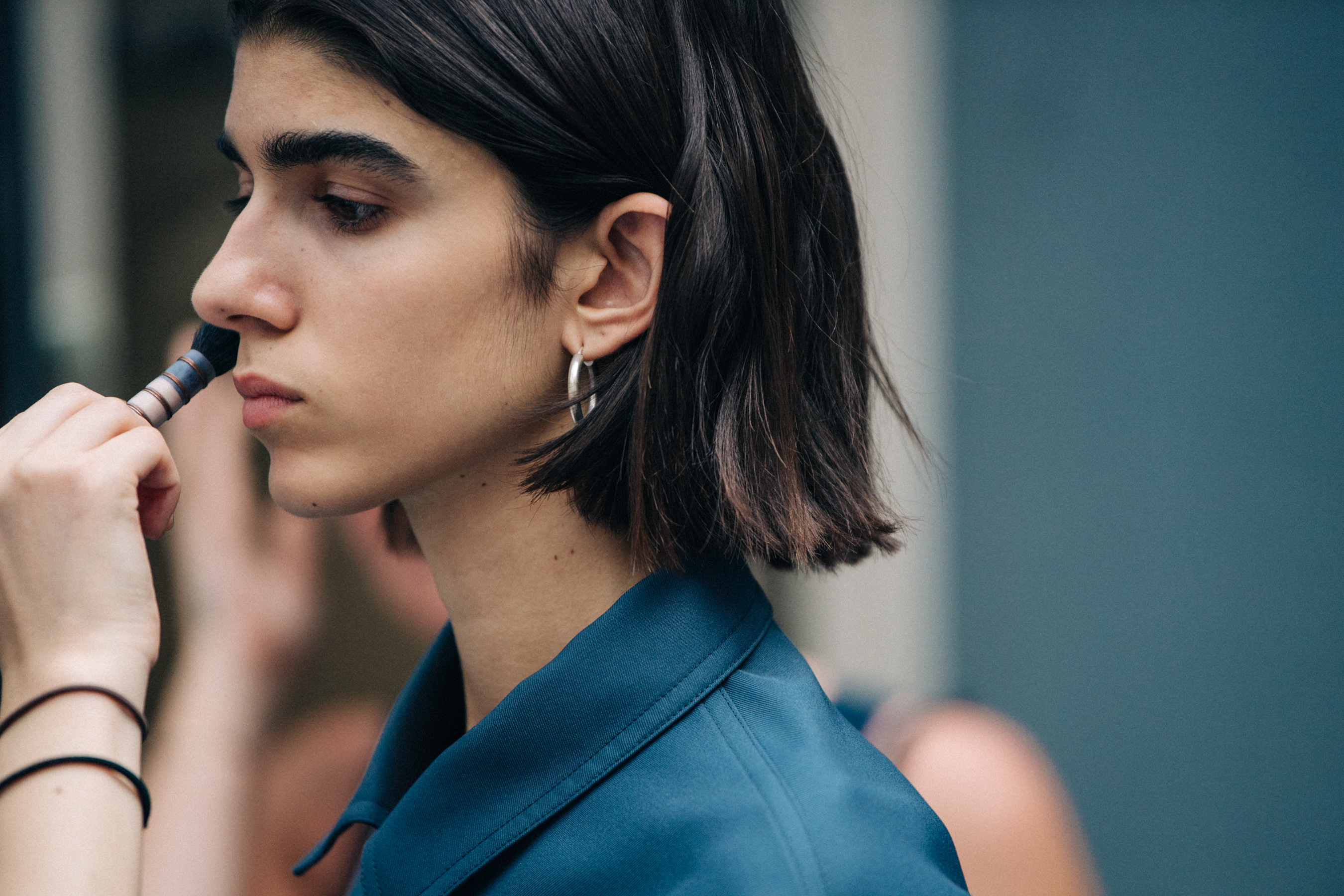 Models wearing blue Jil Sander outfit