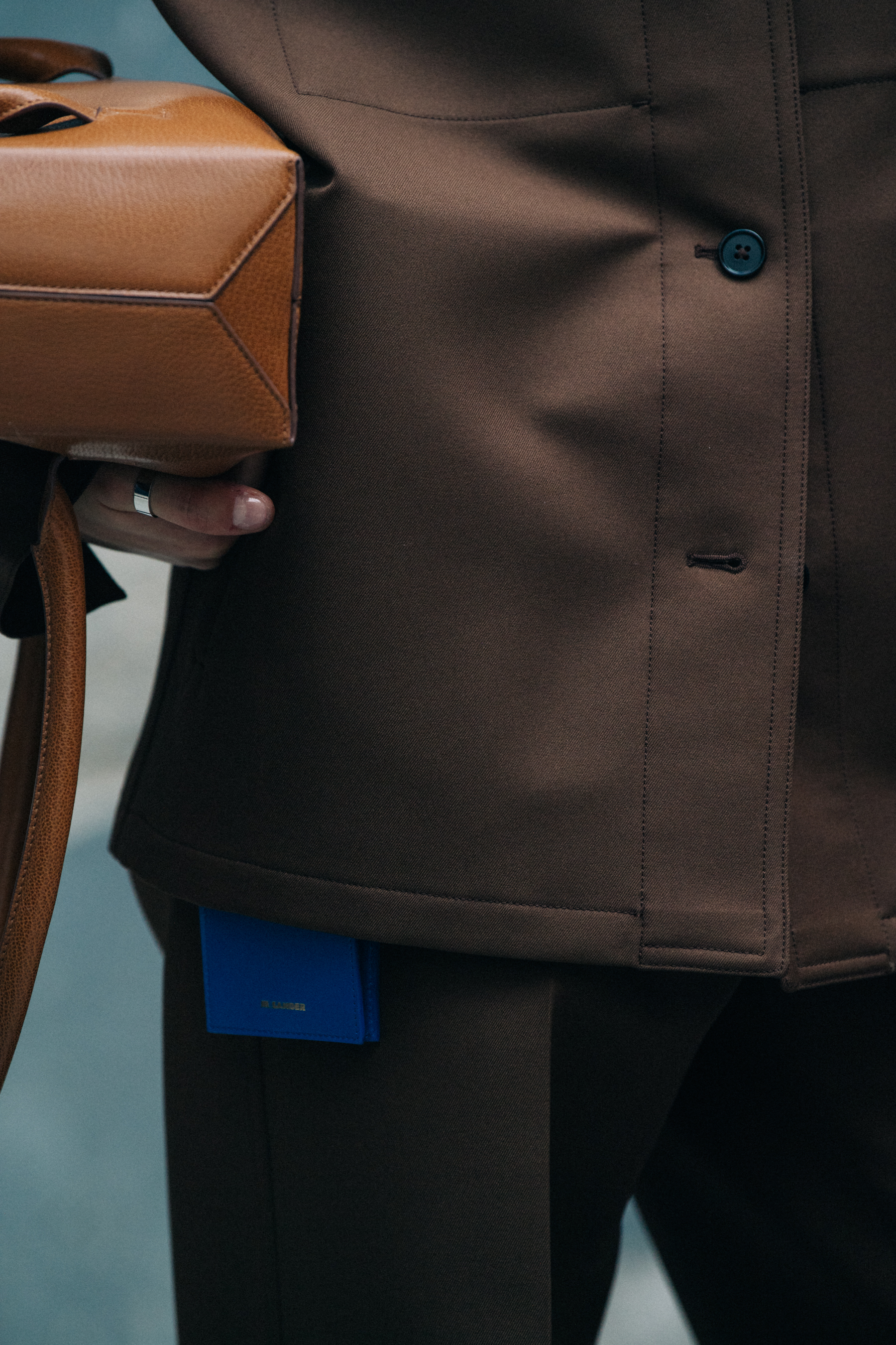 Model wearing brown Jil Sander outfit