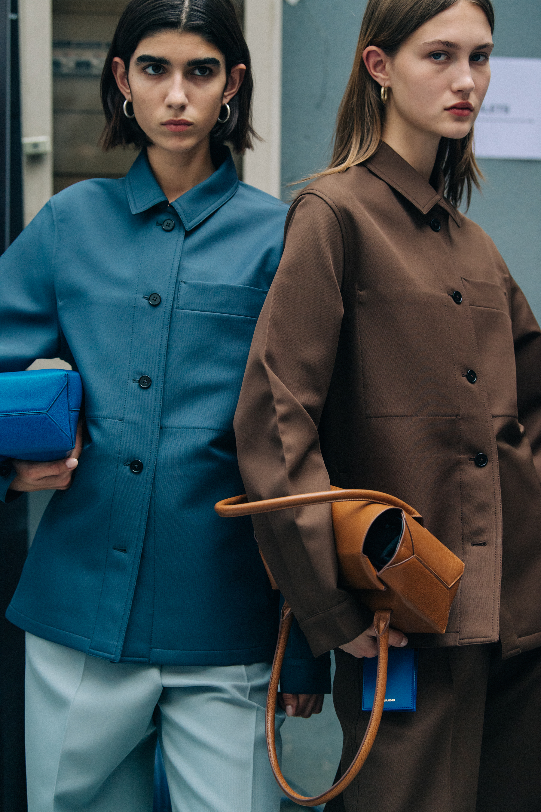 Models wearing blue Jil Sander outfit