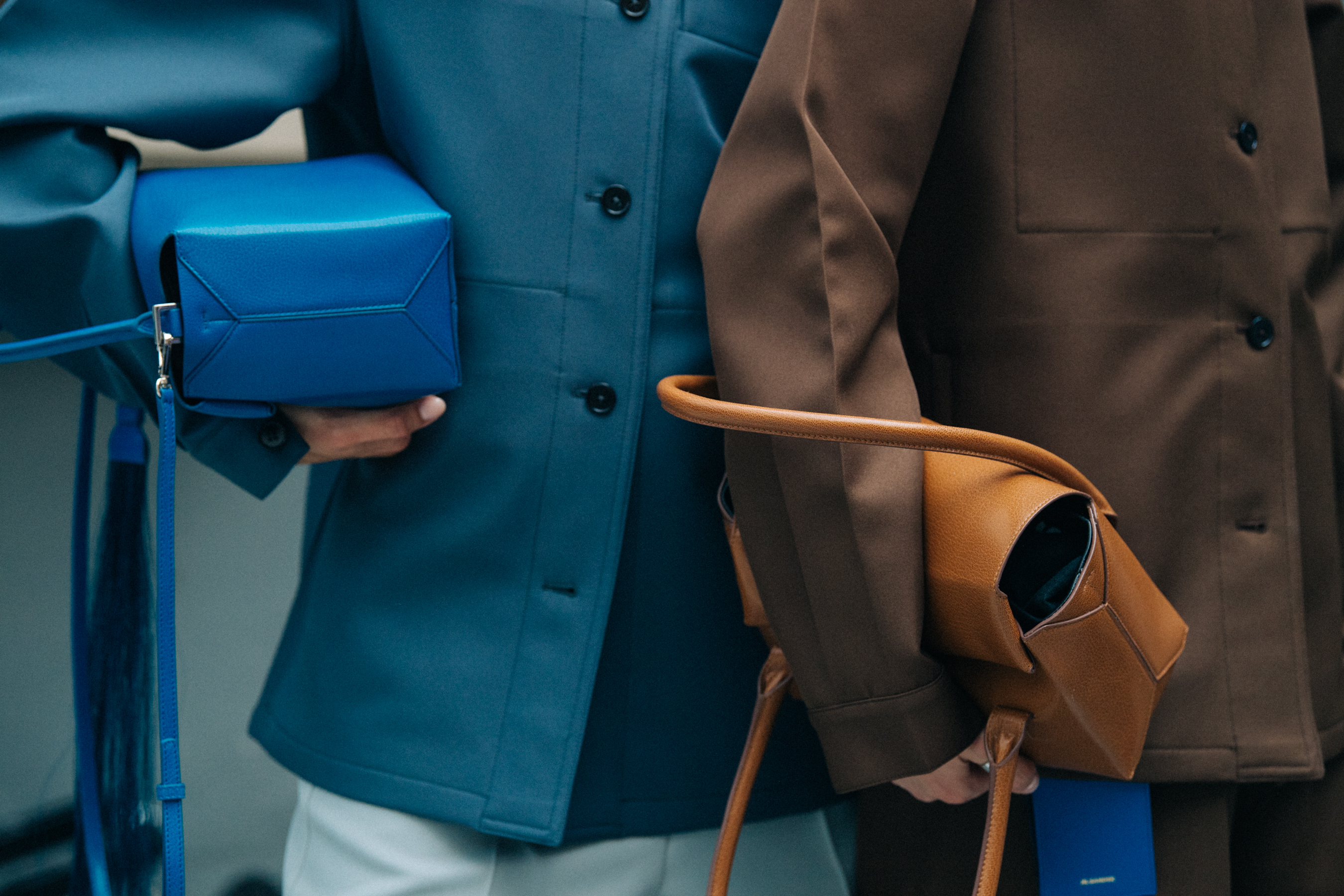Models wearing blue Jil Sander outfit