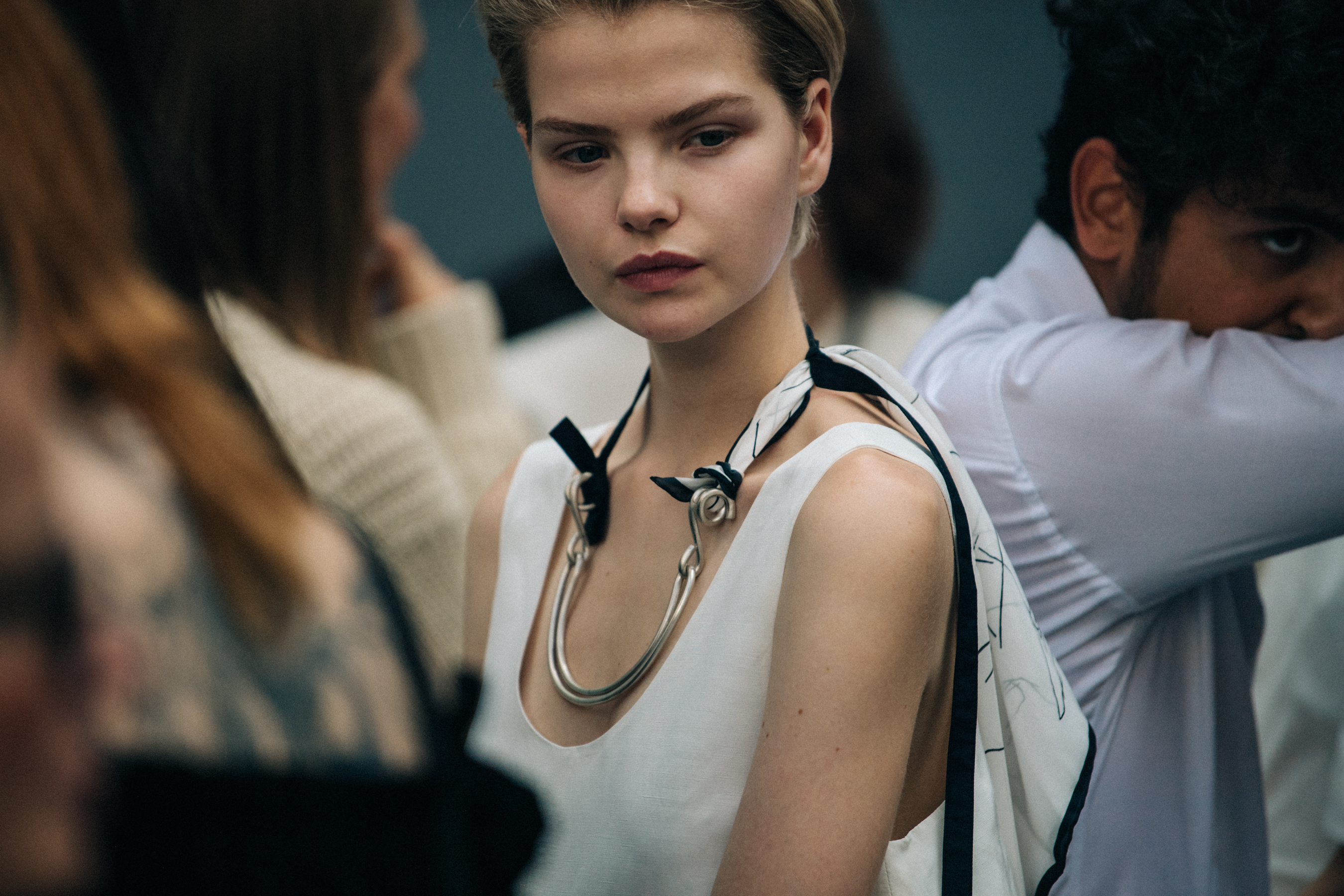 Model wearing white Jil Sander outfit