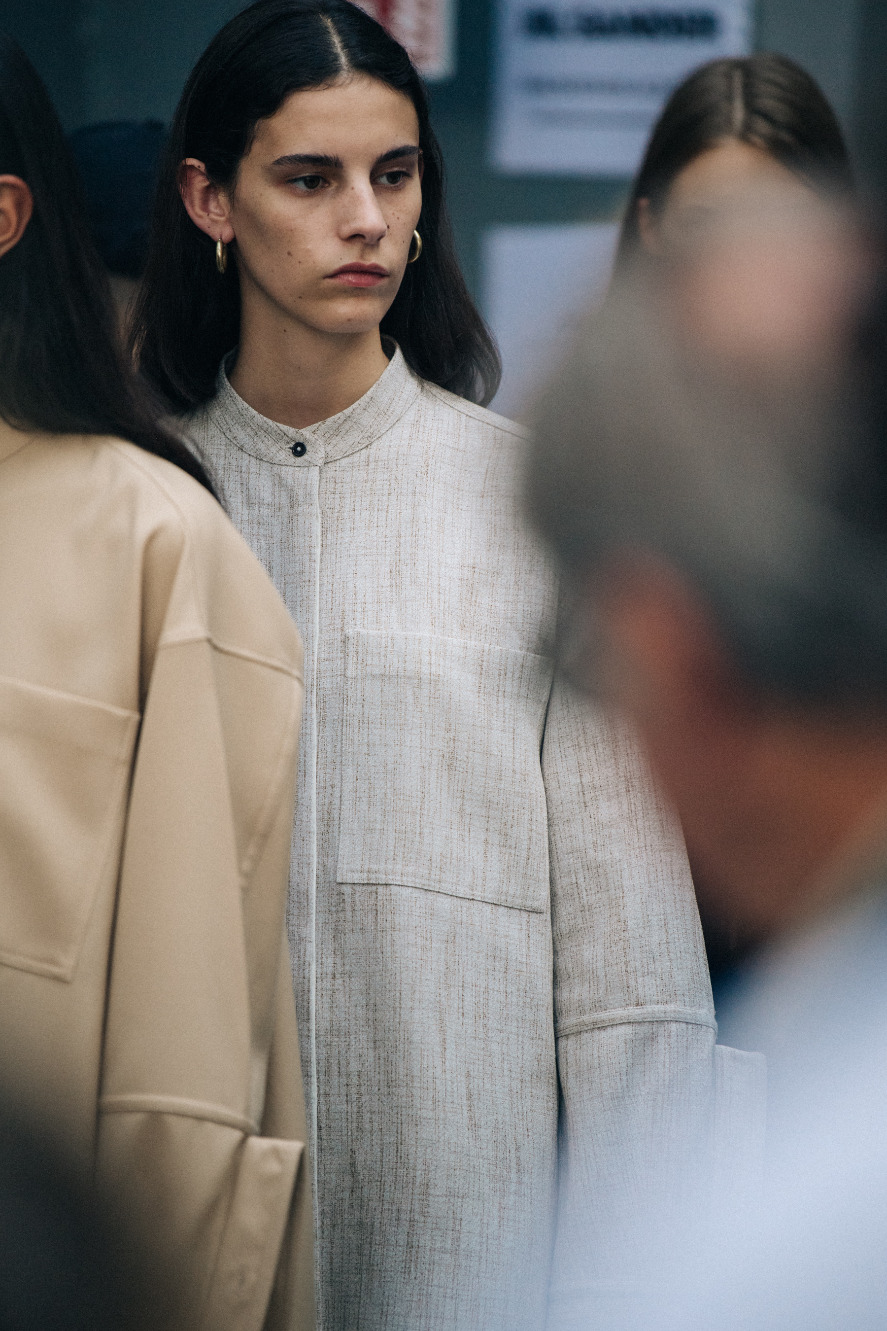 Model wearing white Jil Sander outfit