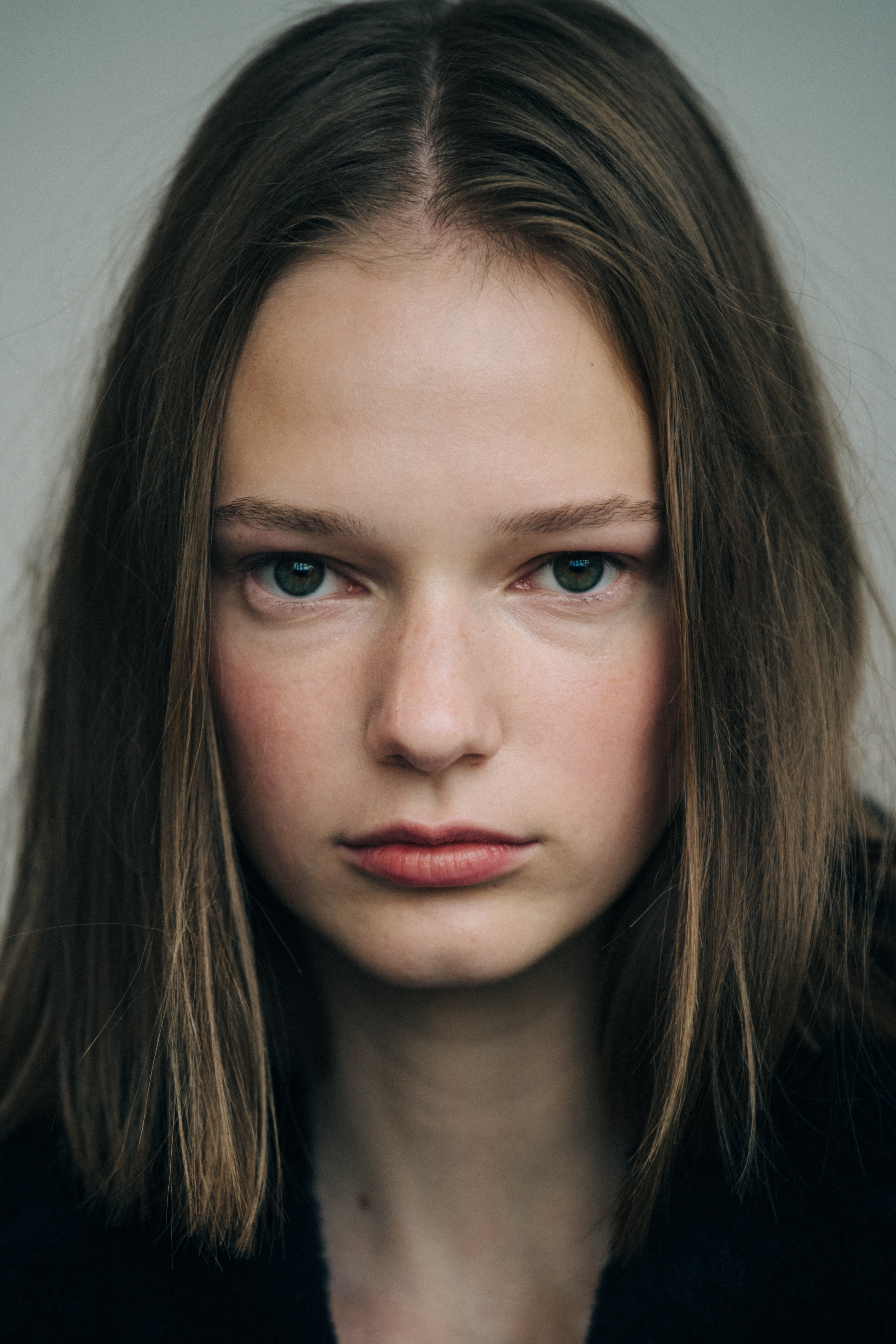 Portrait of model with long dark hair