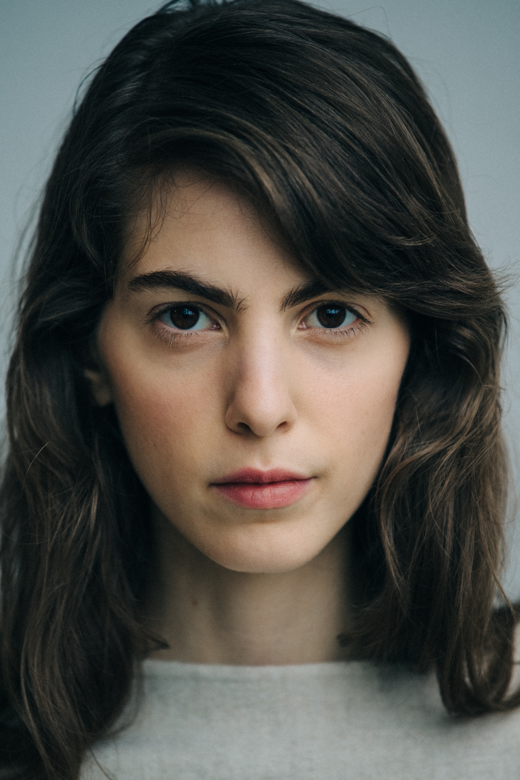 Portrait of model with long dark hair