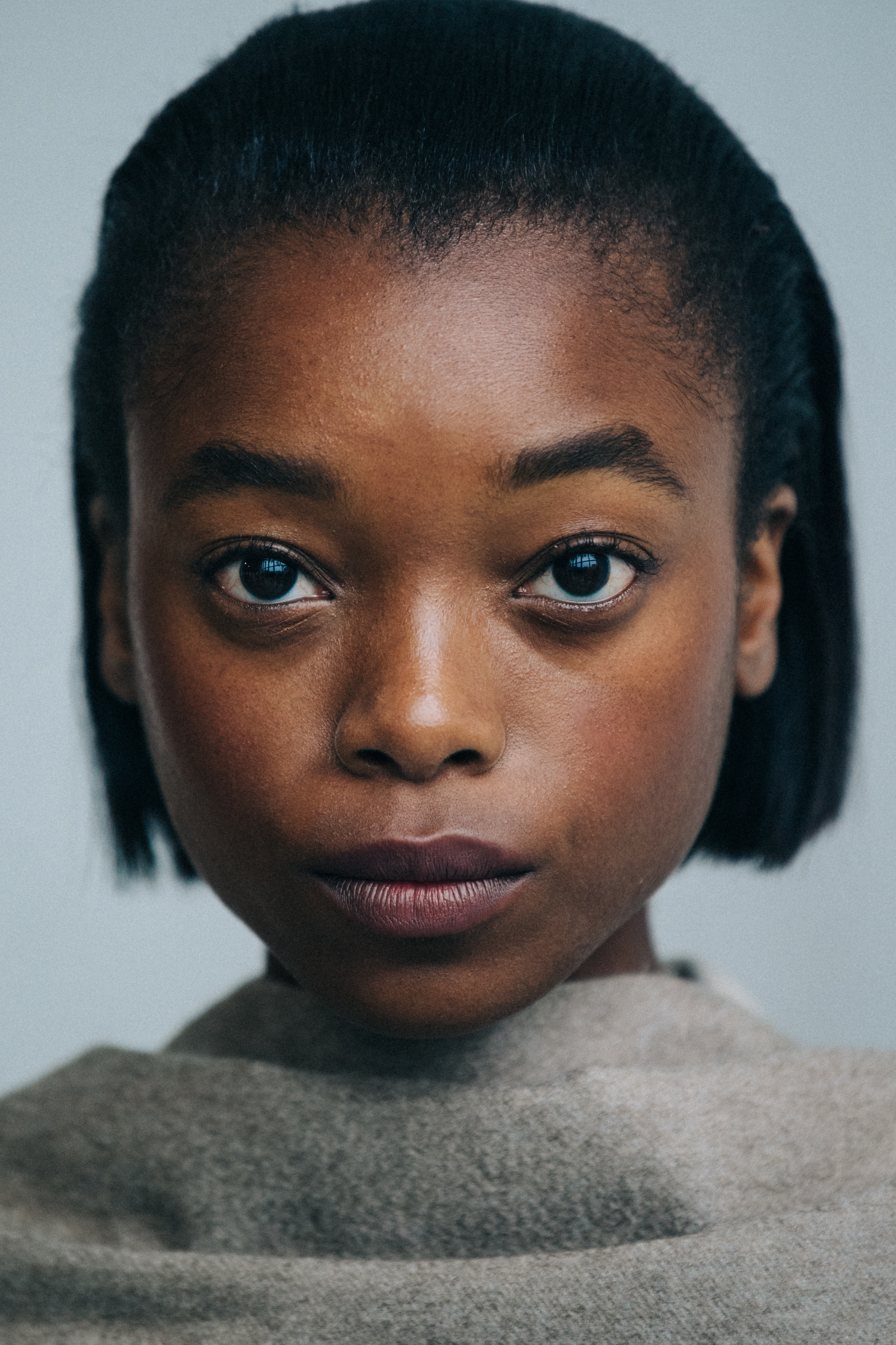 Portrait of model with slick black hair