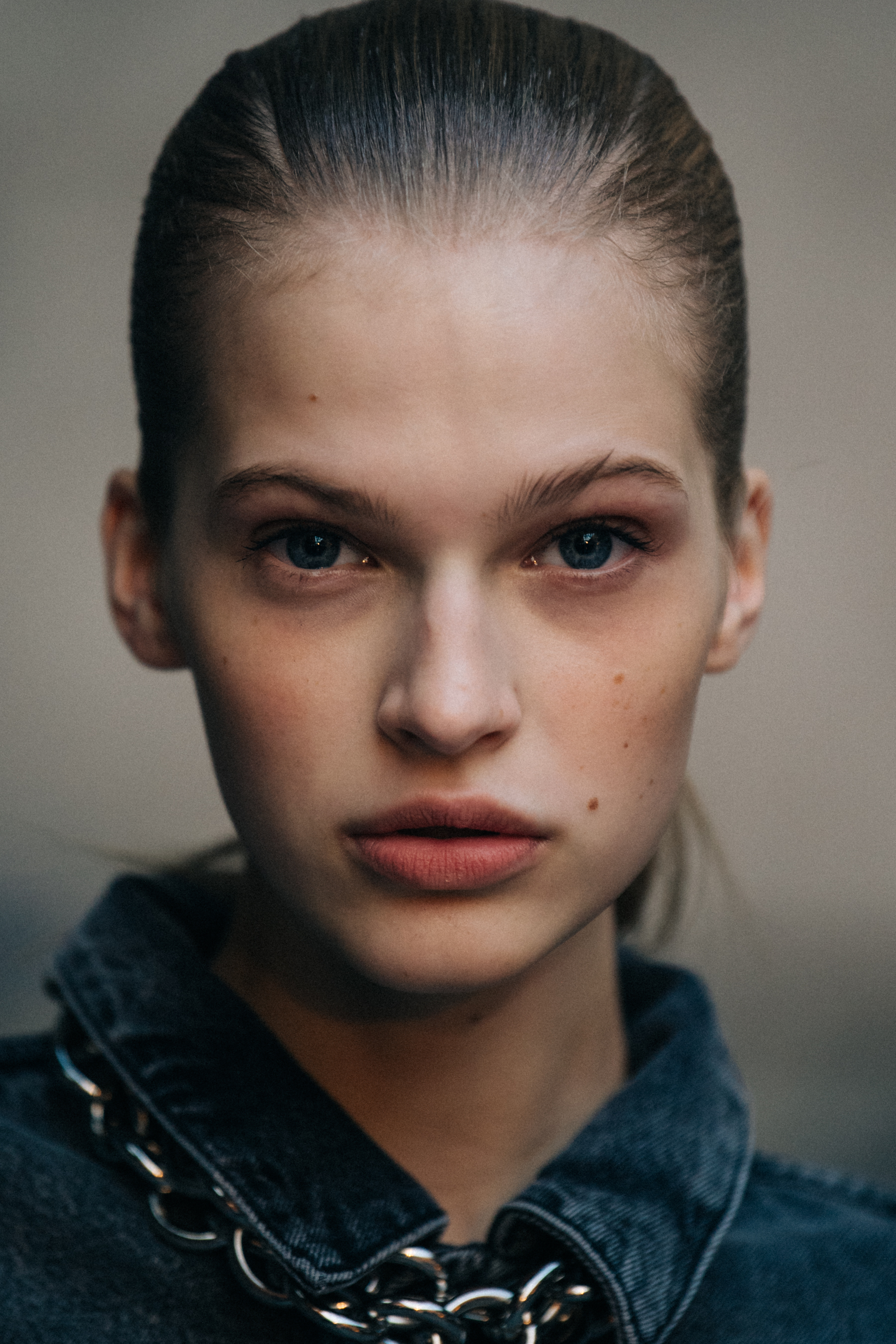 Portrait of model with slicked back hair