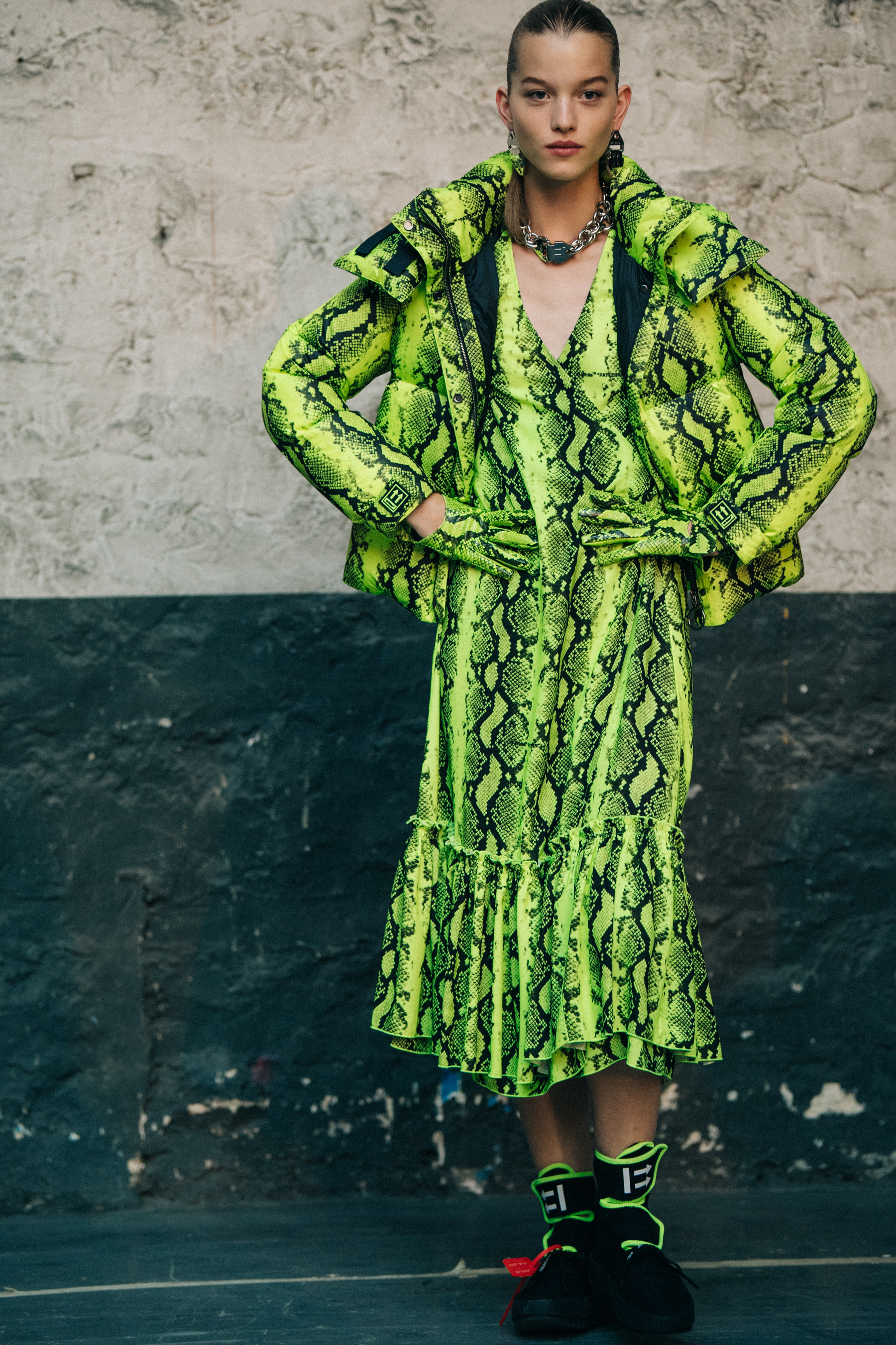 Model wearing green snakeskin at Off-White