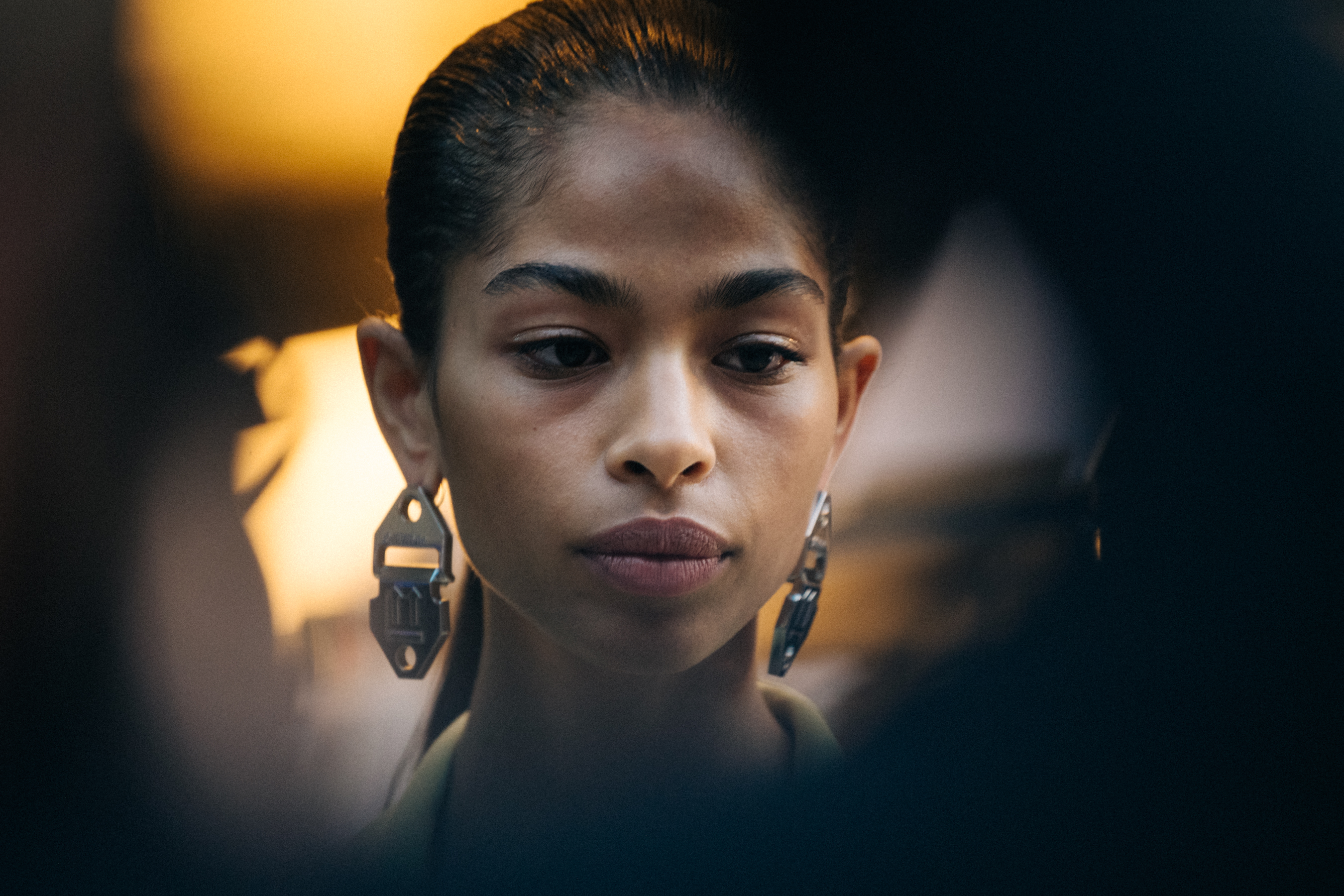 Model wearing Off-White earrings