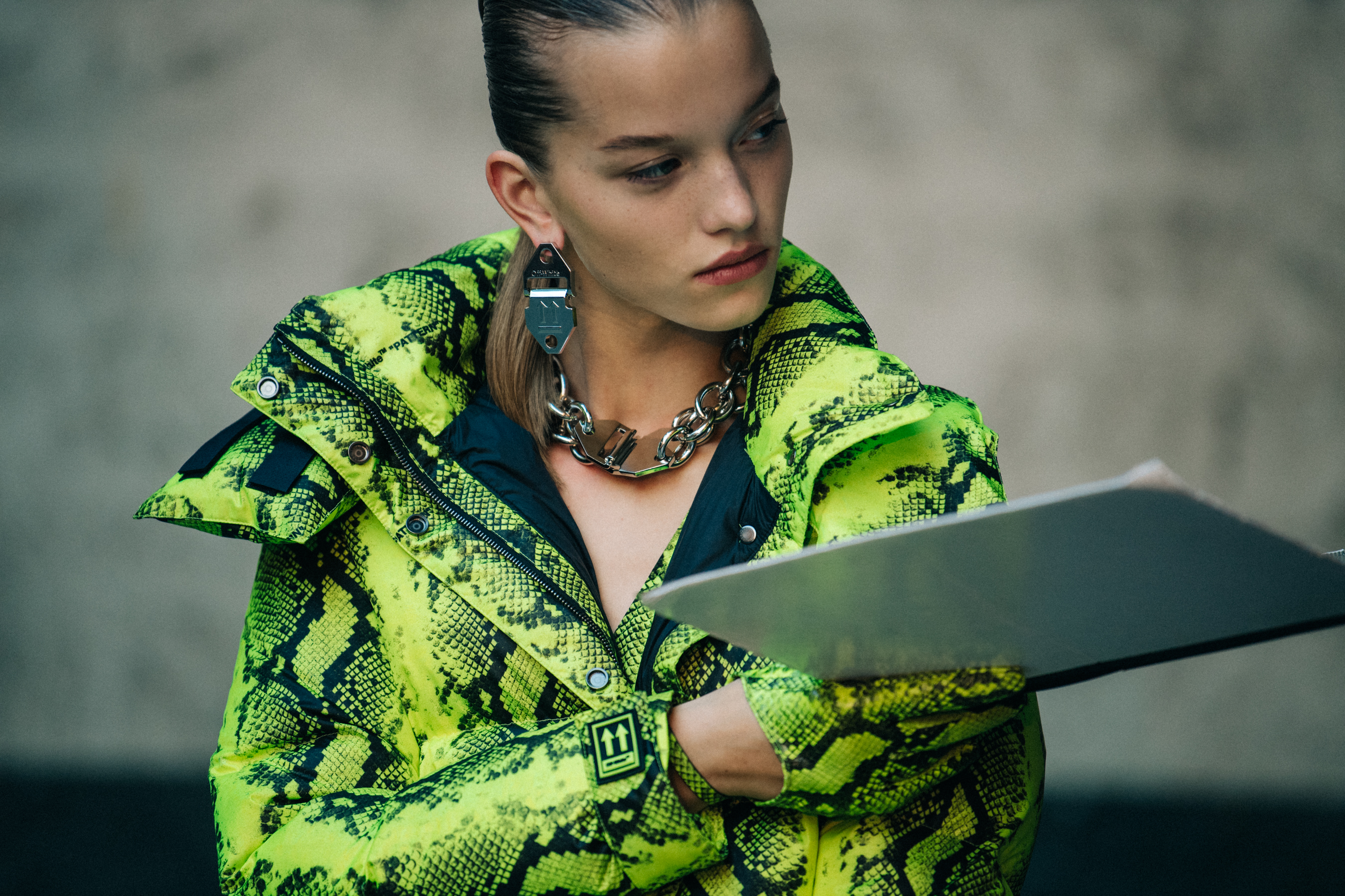Model wearing green snakeskin at Off-White