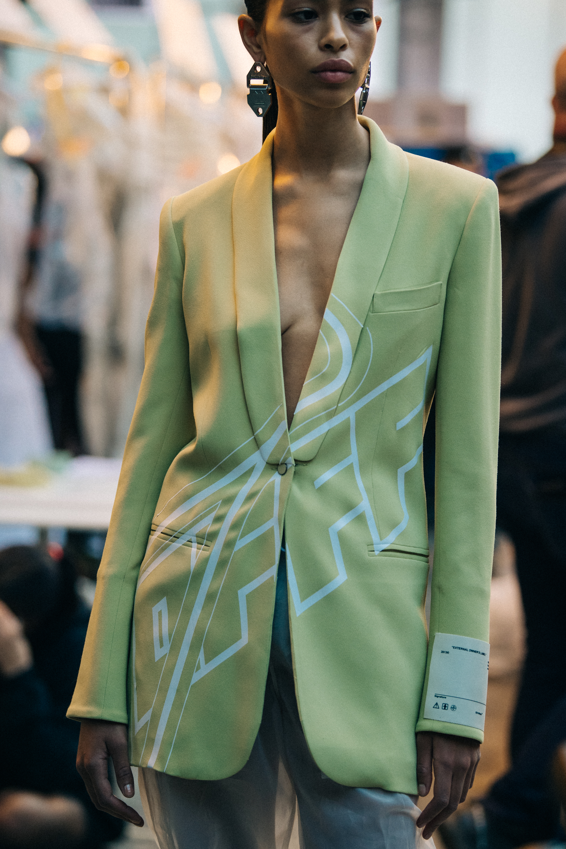 Model wearing pale yellow at Off-White
