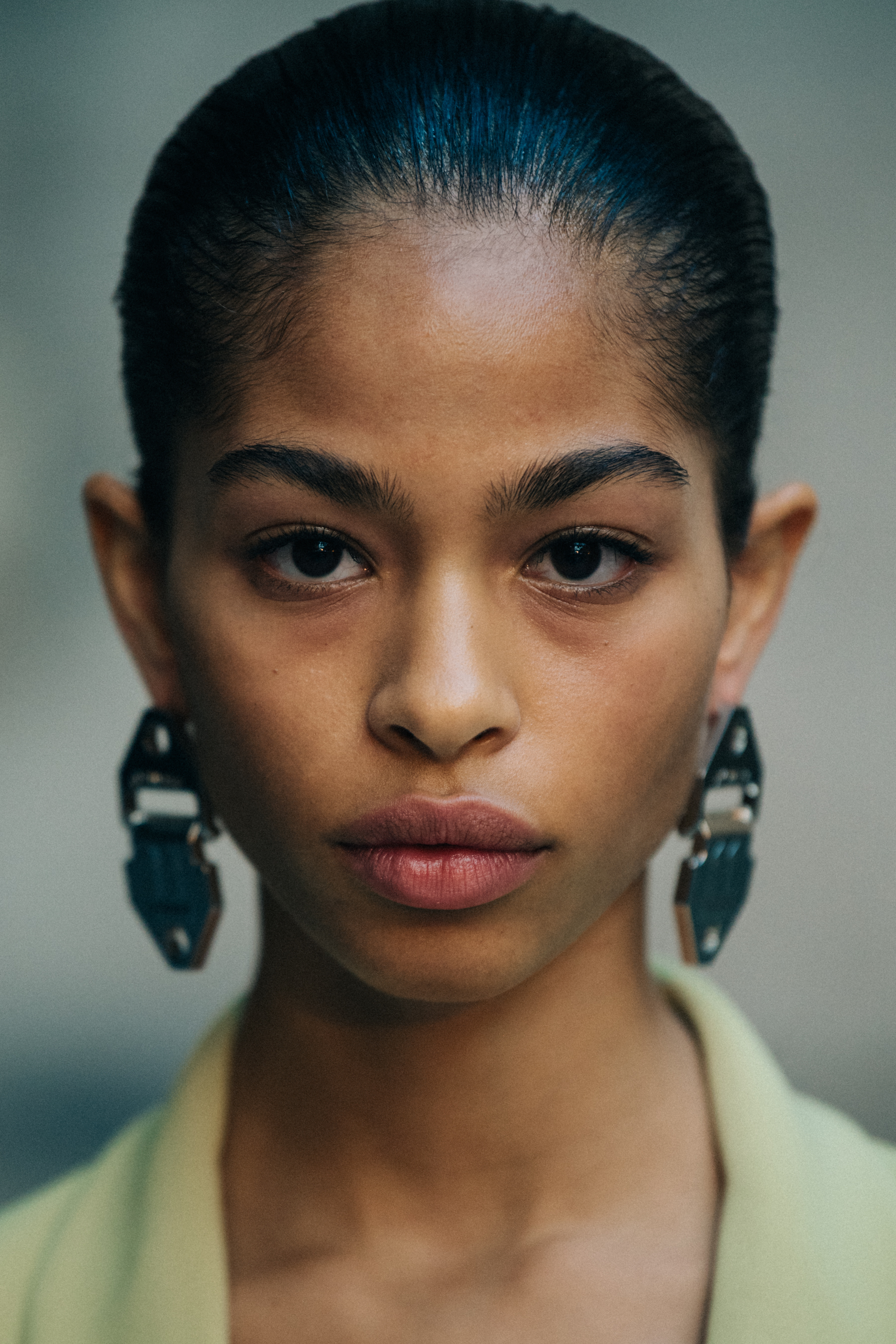 Portrait of model with slicked back hair