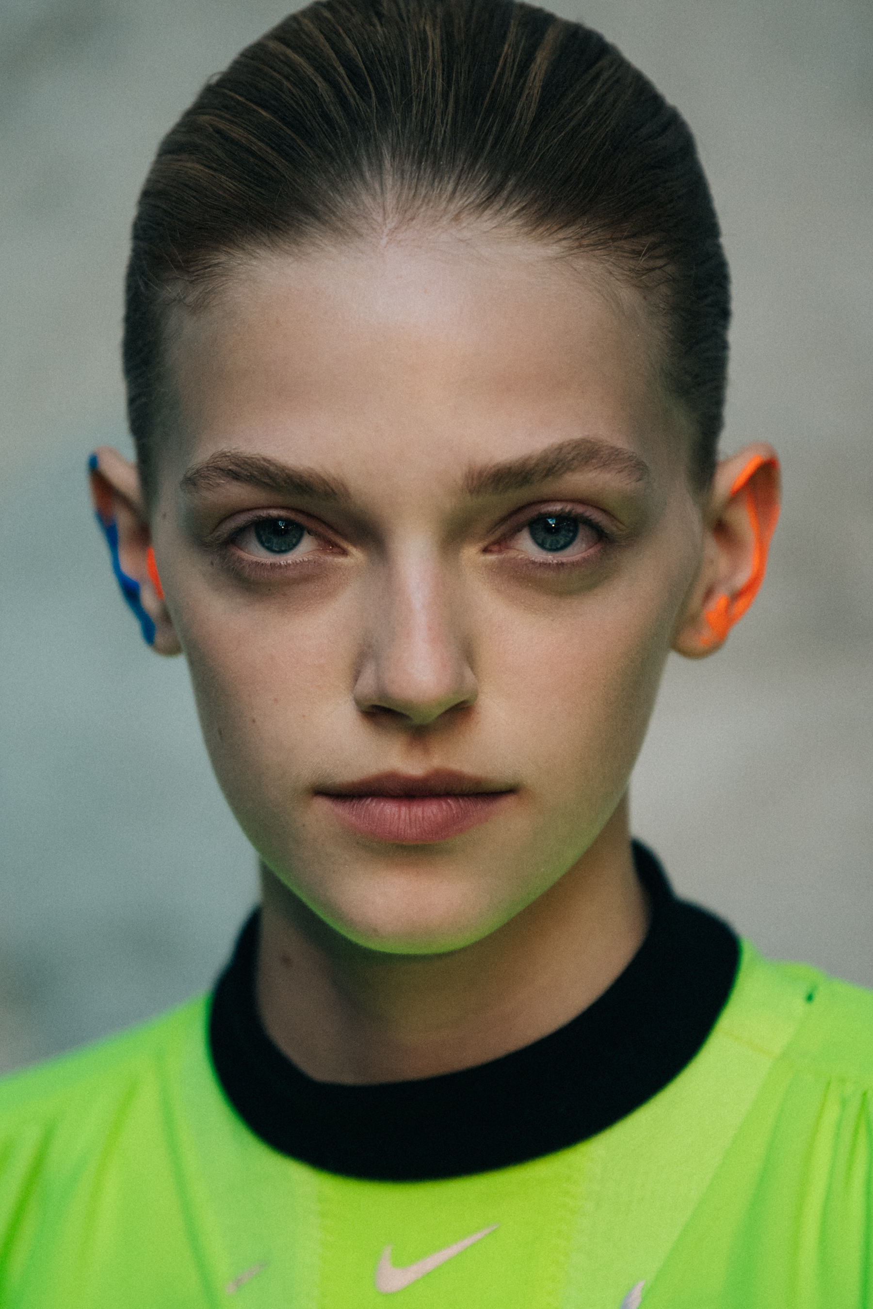 Portrait of model with slicked back hair