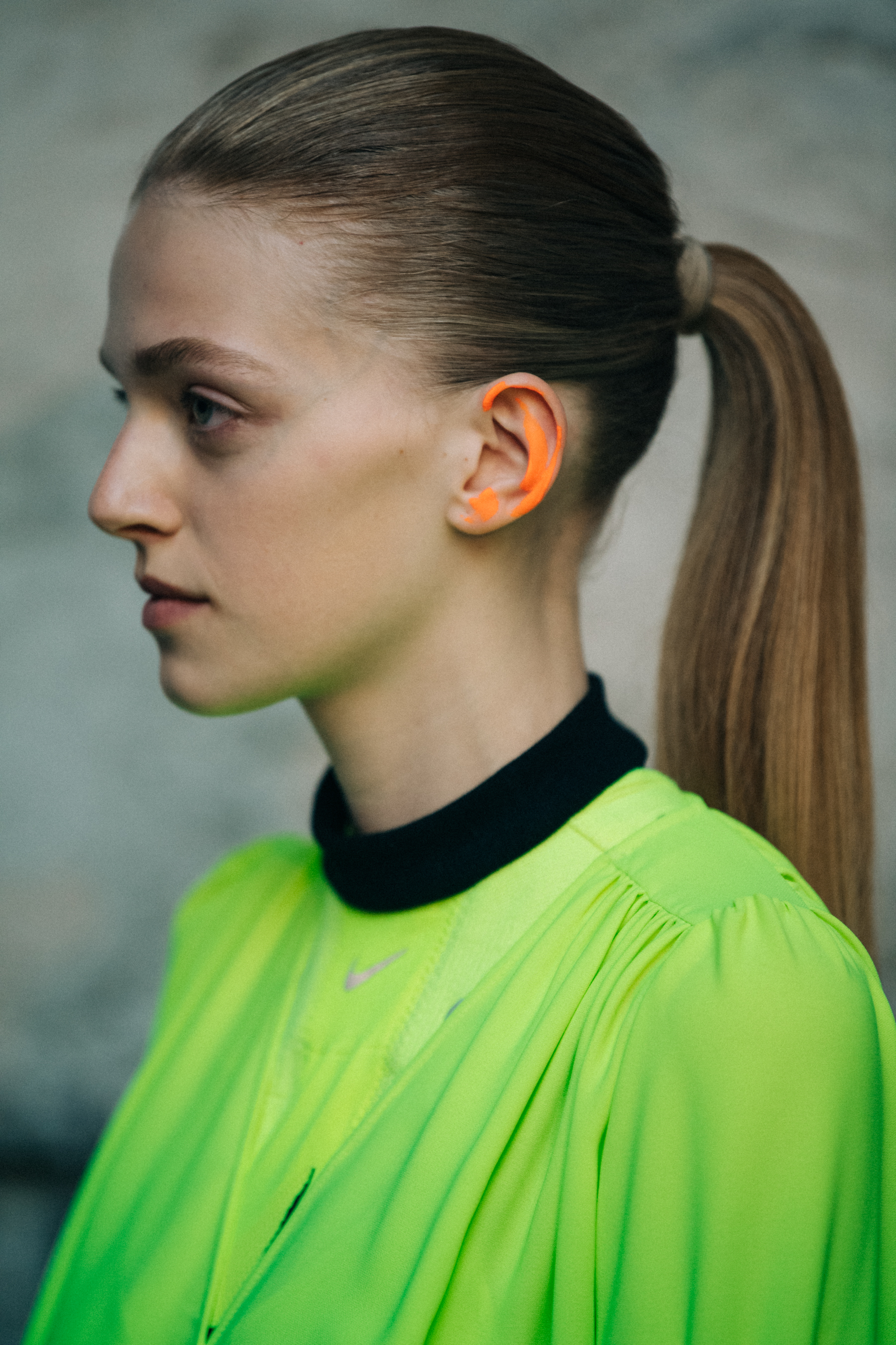 Model wearing fluro yellow at Off-White