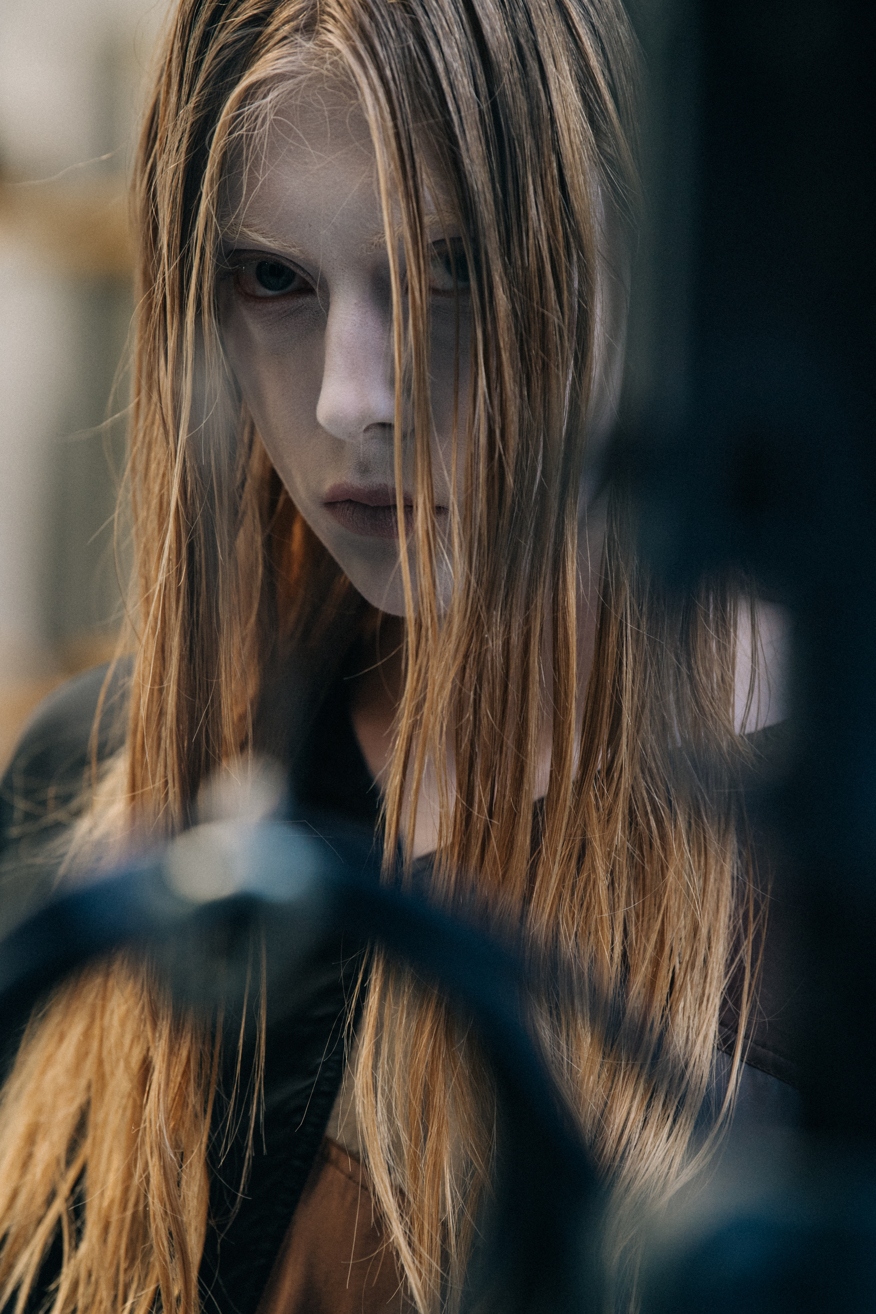 Model wearing face paint at Rick Owens