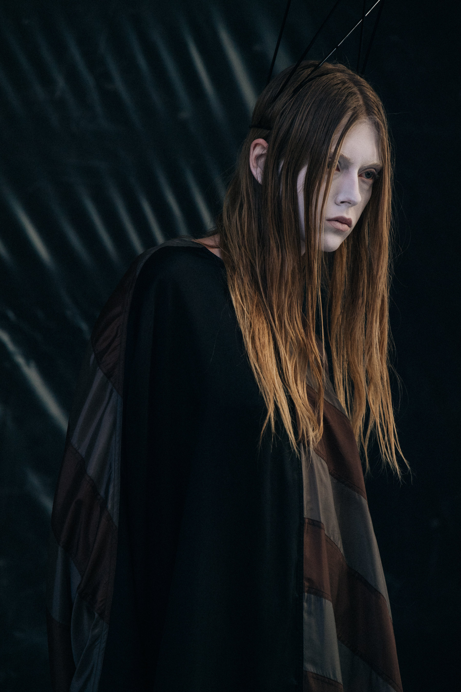 Model wearing face paint at Rick Owens