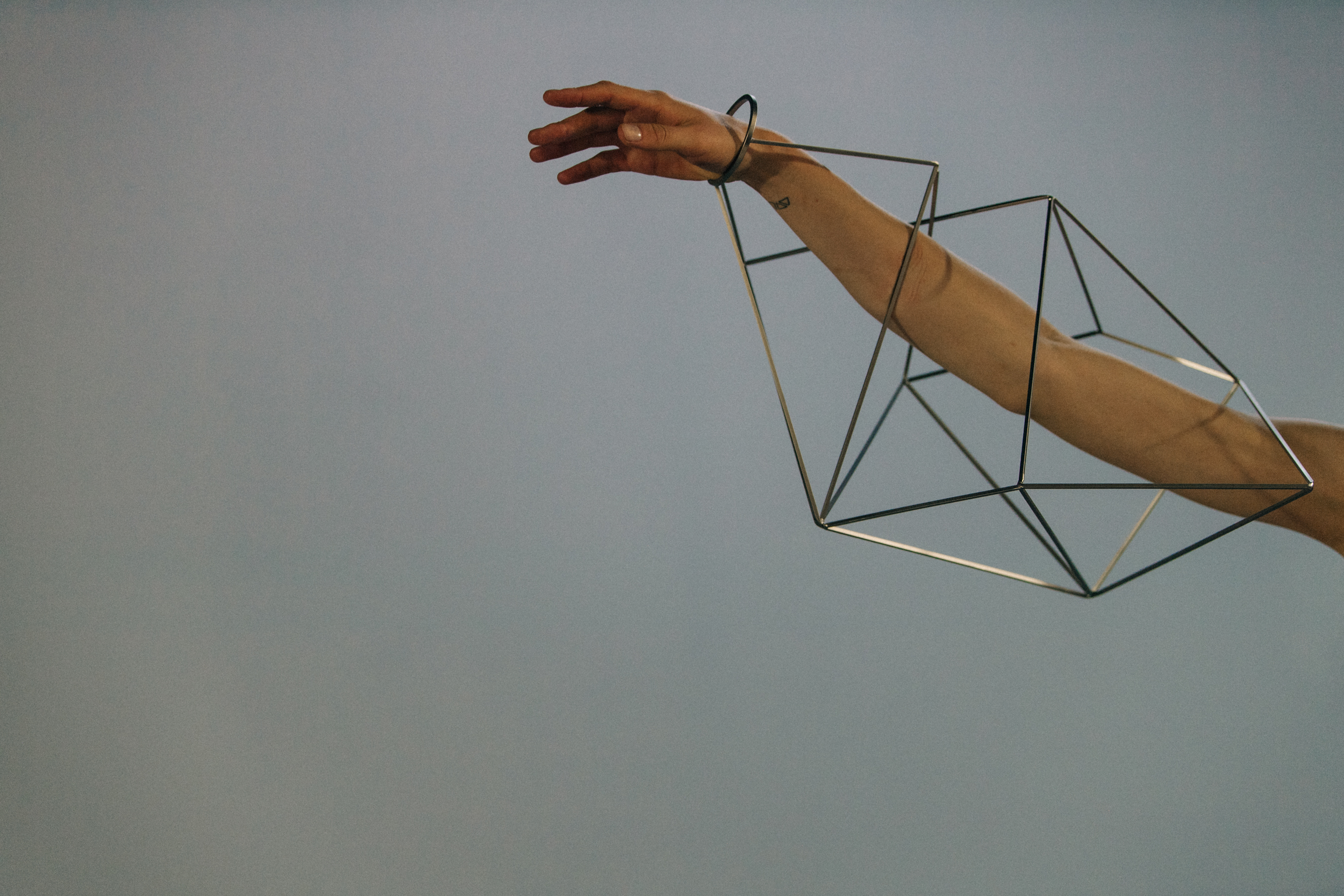 Model wearing metal structure at Rick Owens