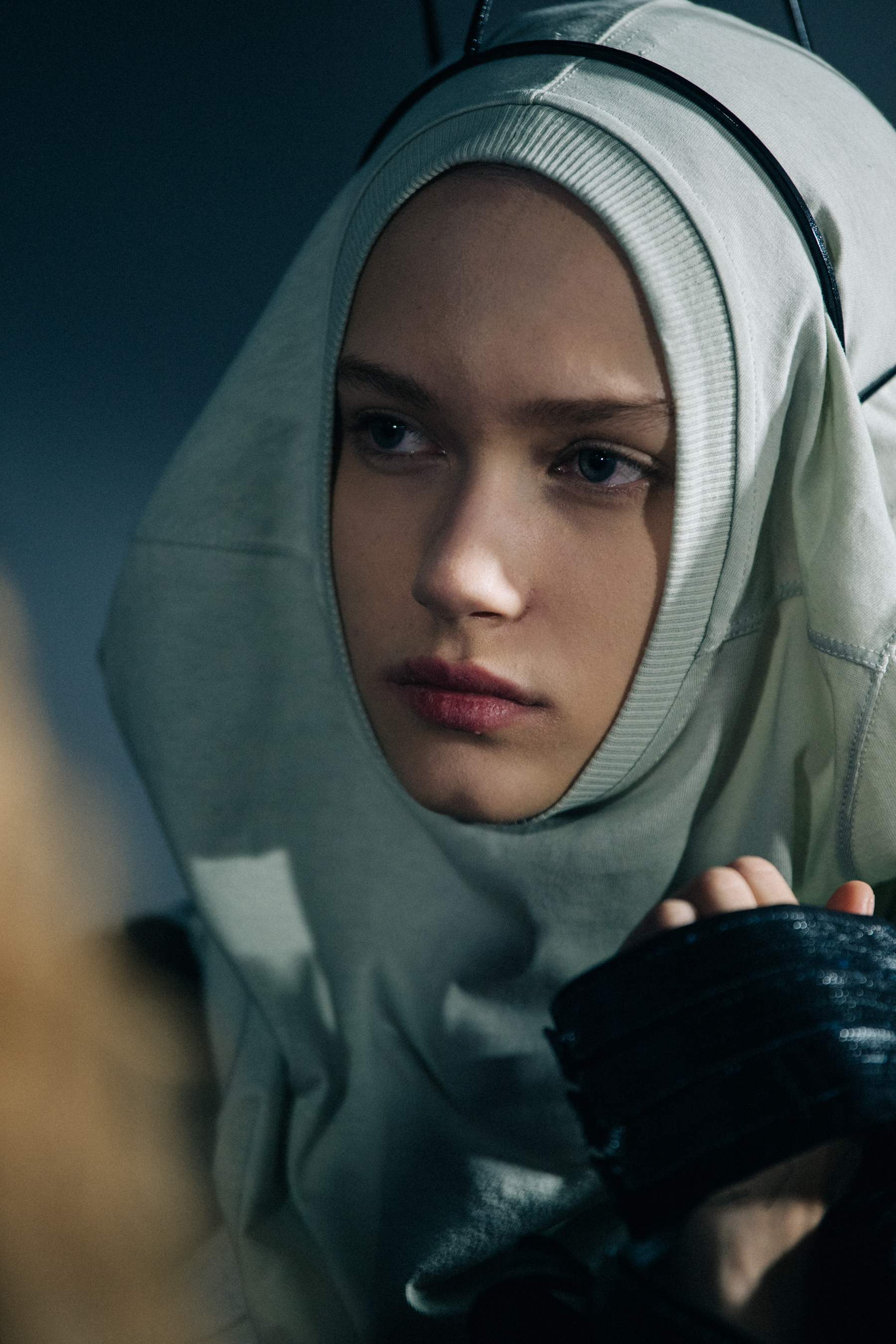 Model wearing grey hoodie at Rick Owens