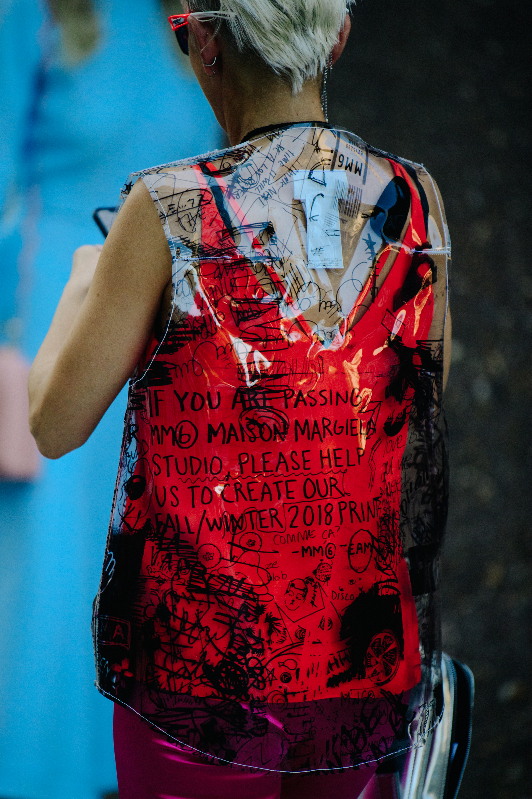 Woman wearing plastic top