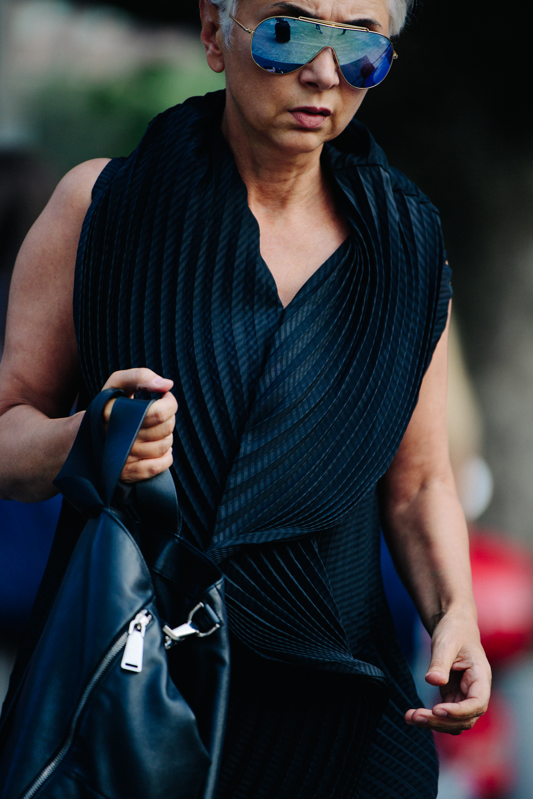 Woman wearing large sunglasses