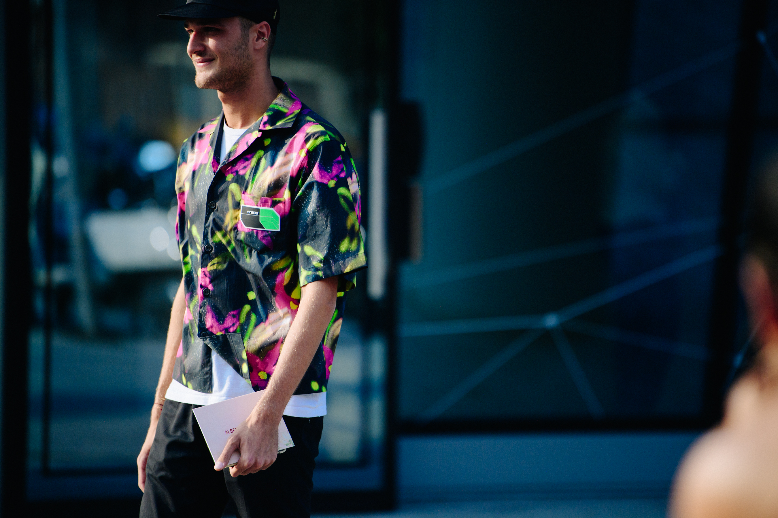 Man wearing colourful shirt