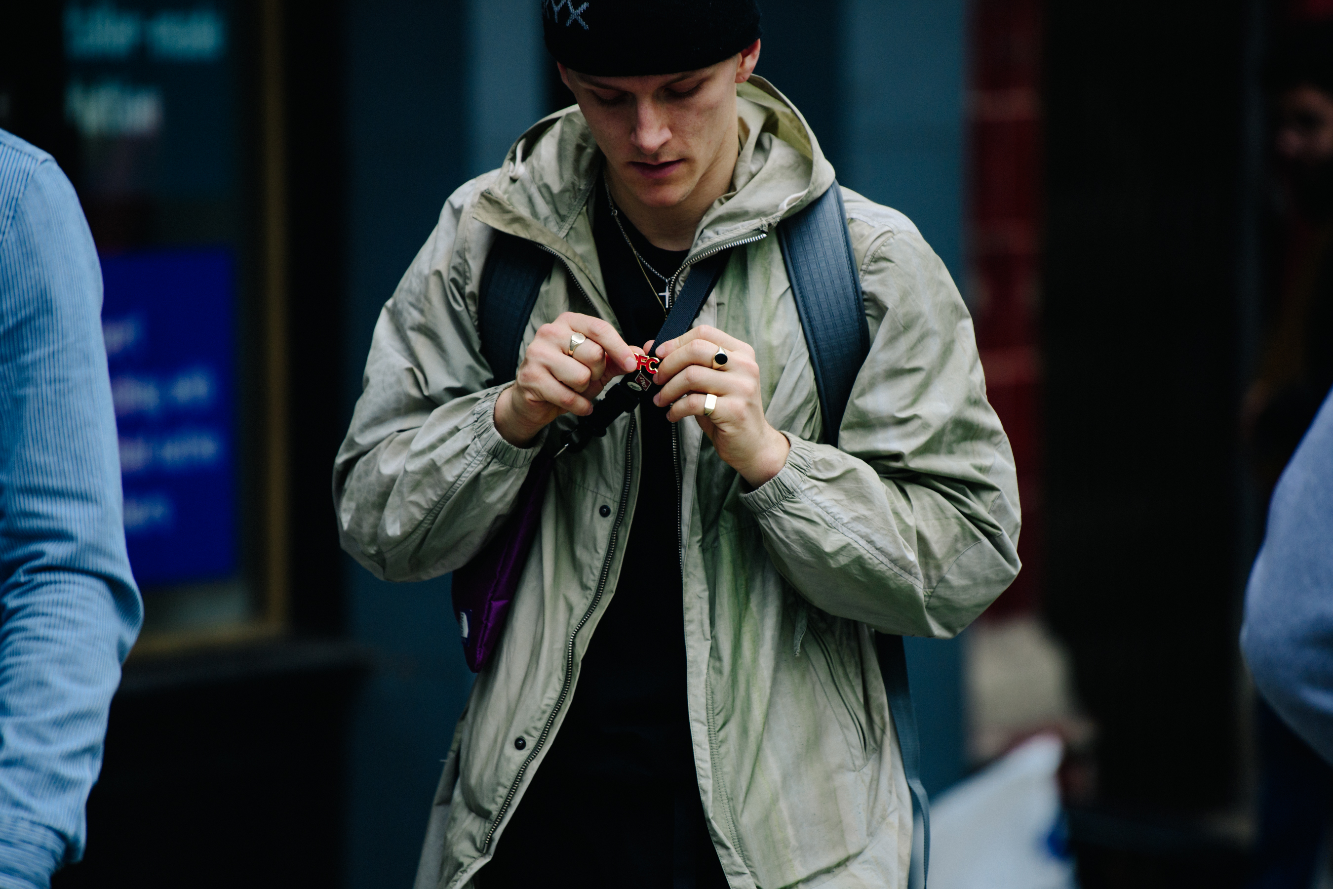Man wearing gold rings
