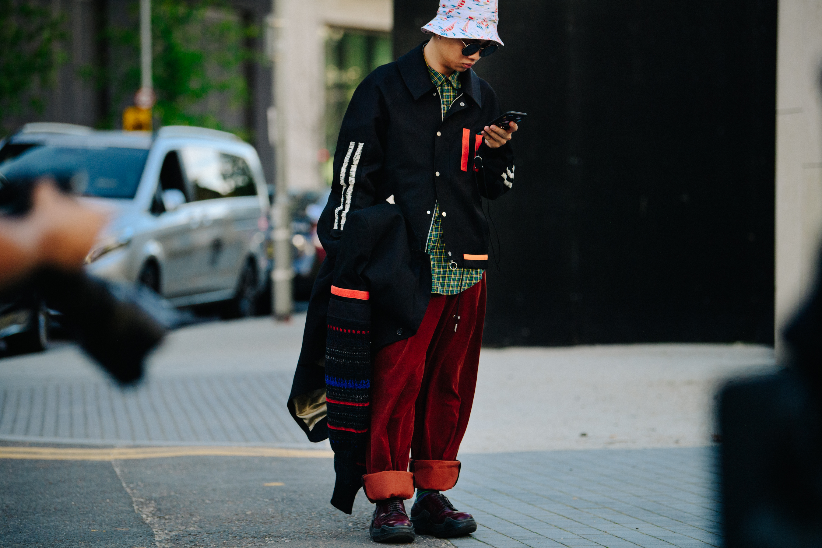 Man wearing orange pants