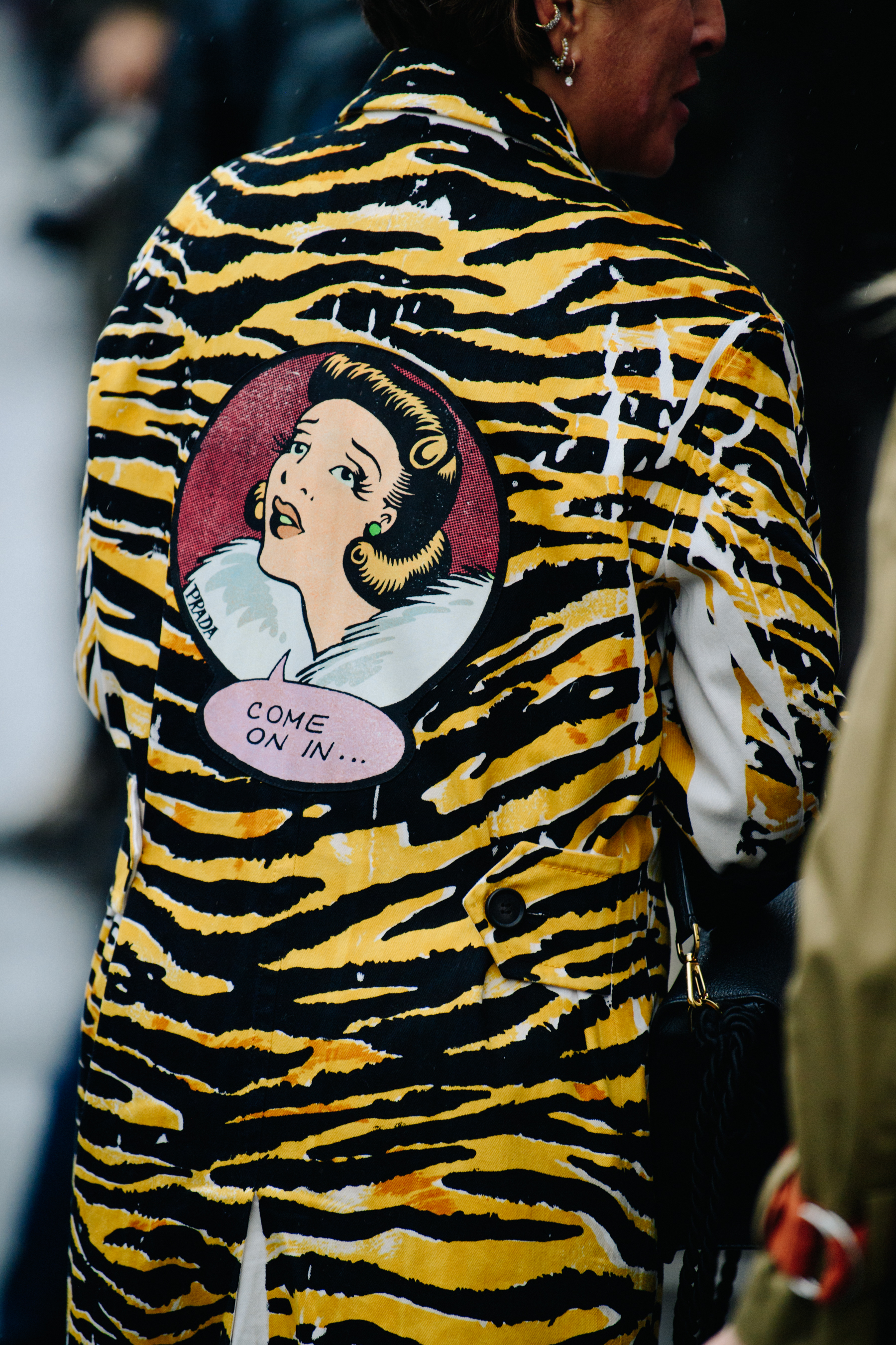 Woman wearing animal print coat