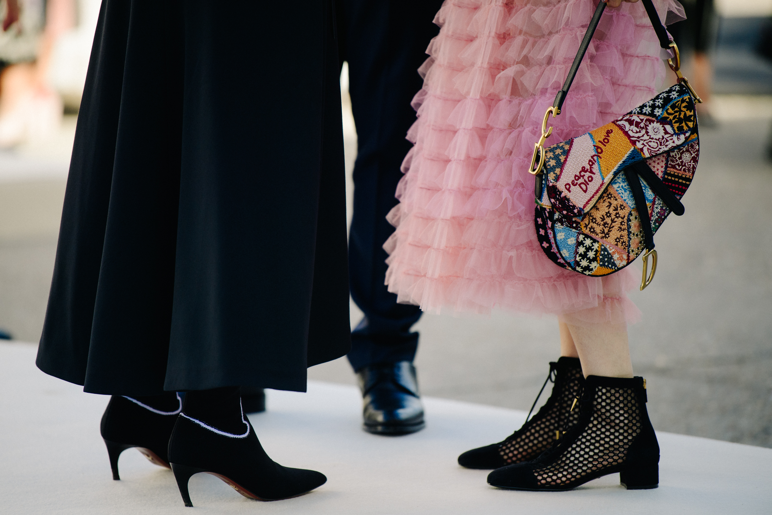 Woman carrying Christian Dior bag