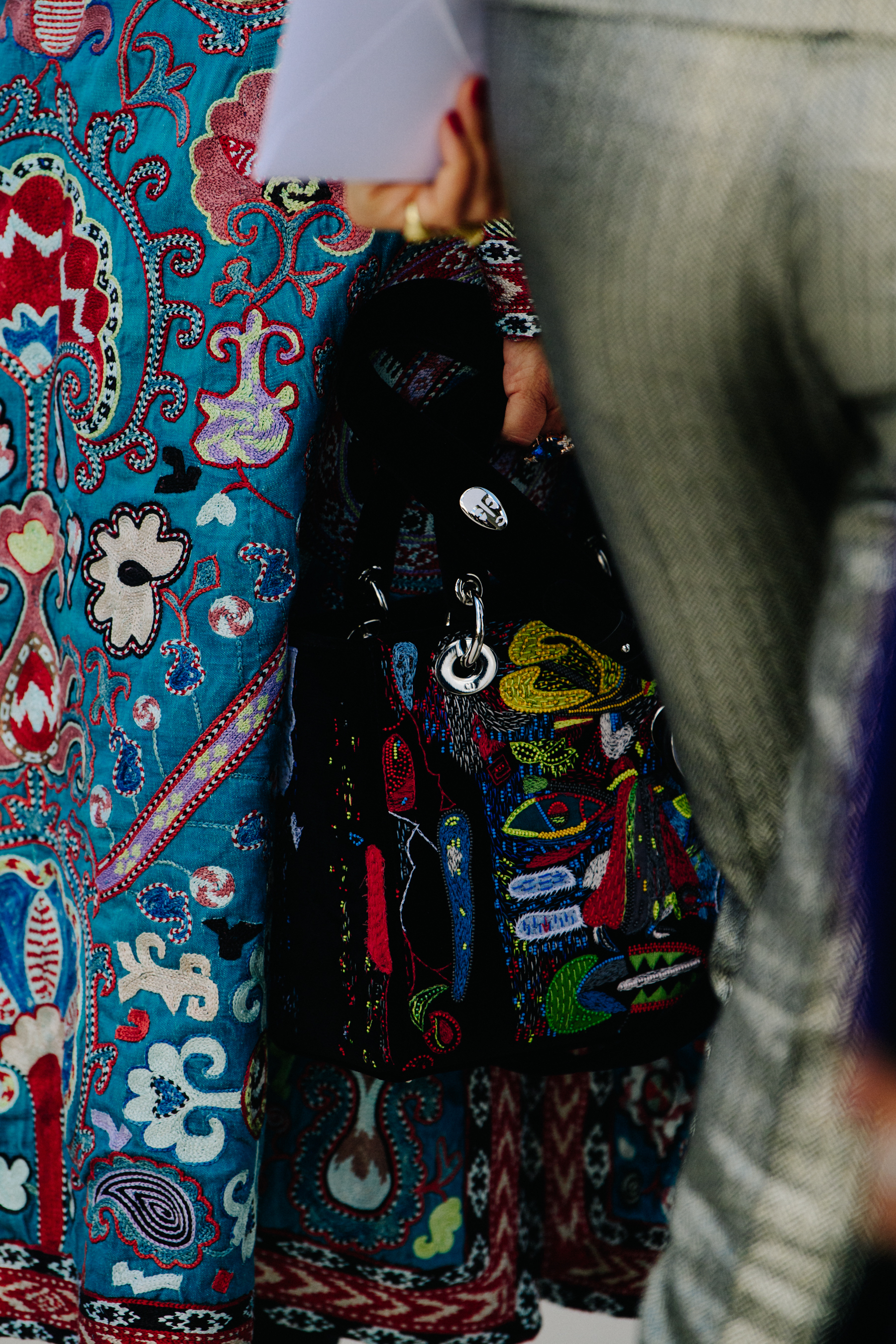 Woman carrying Christian Dior bag