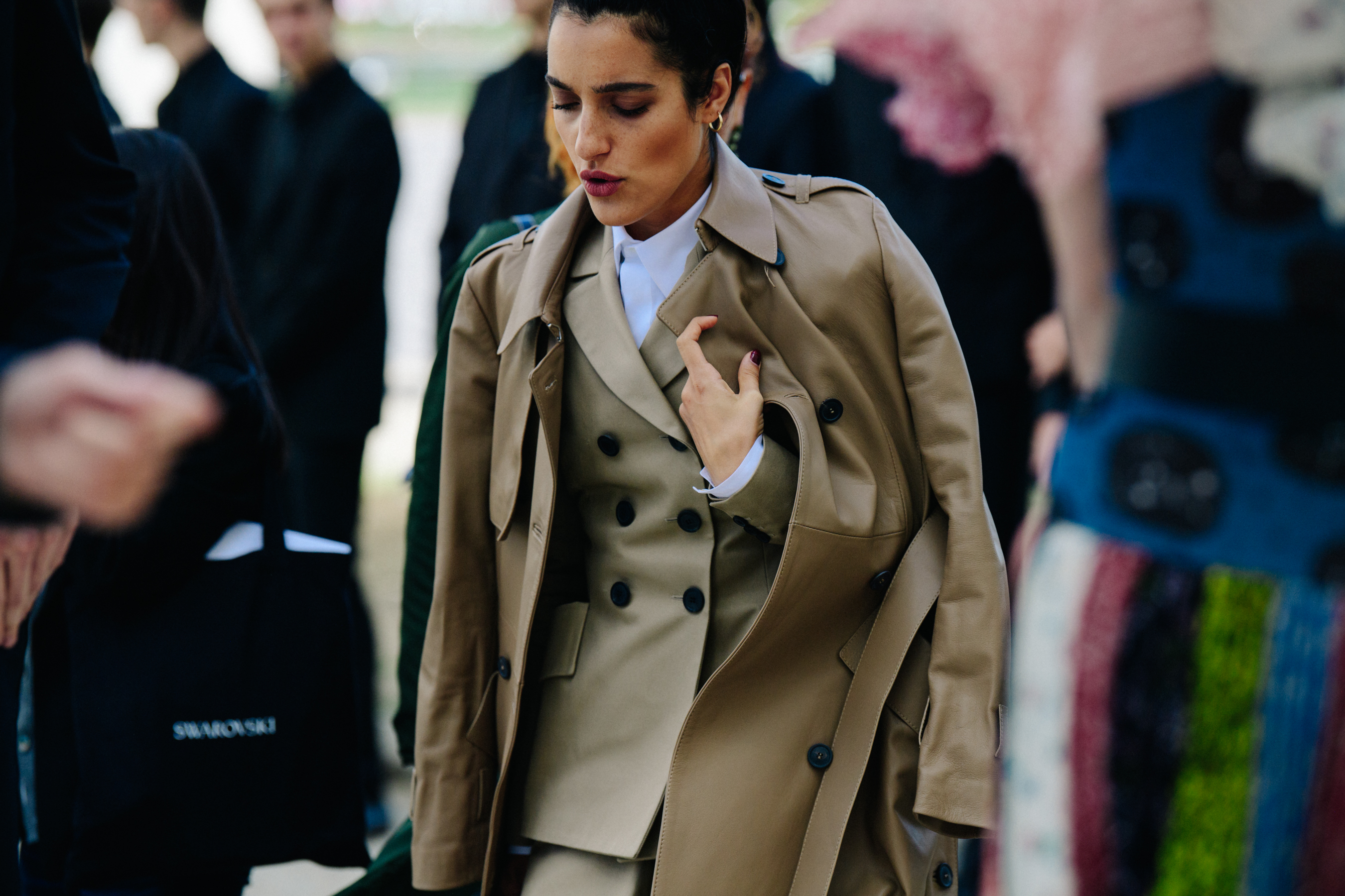 Woman wearing long trench coat