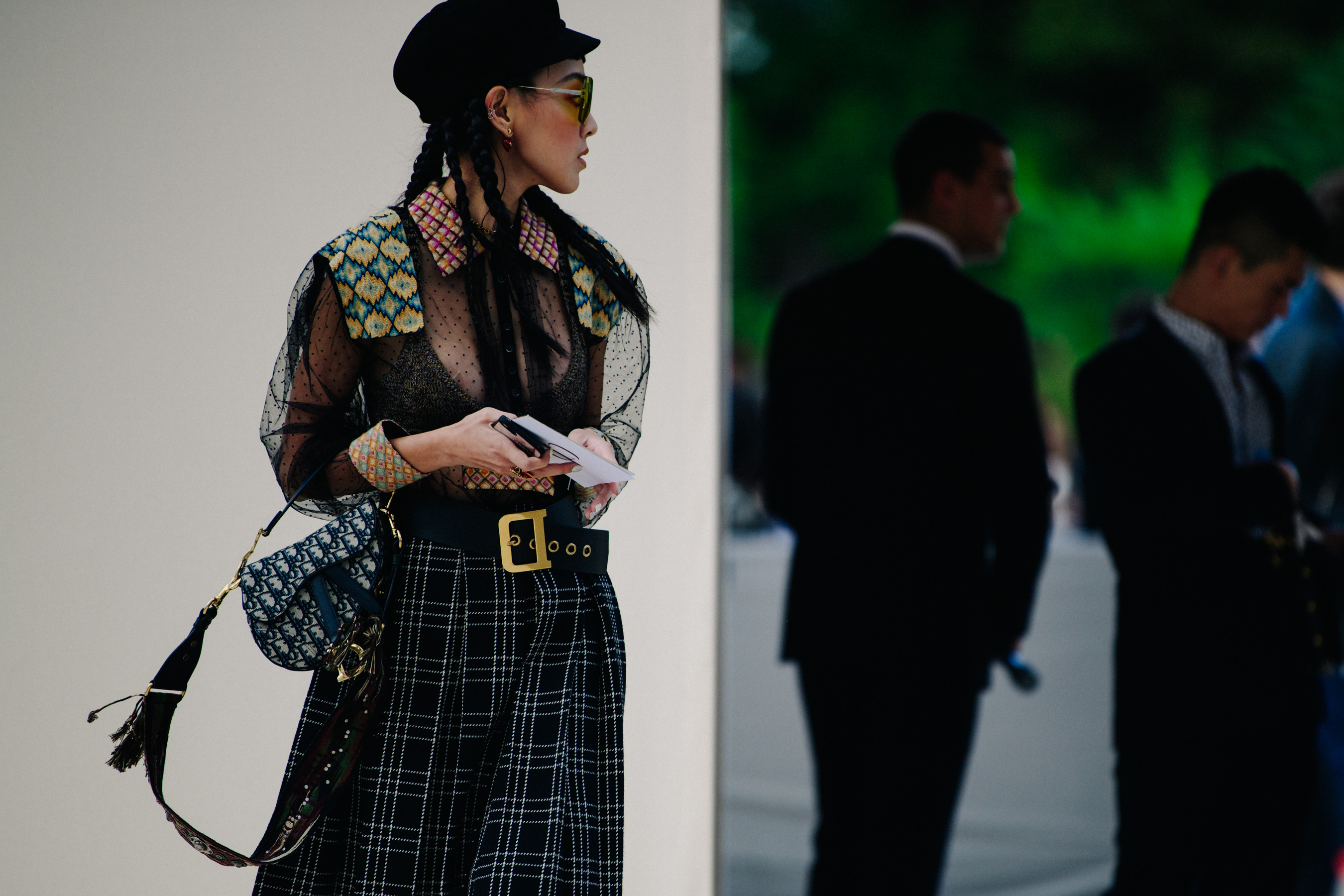 Woman carrying Christian Dior bag