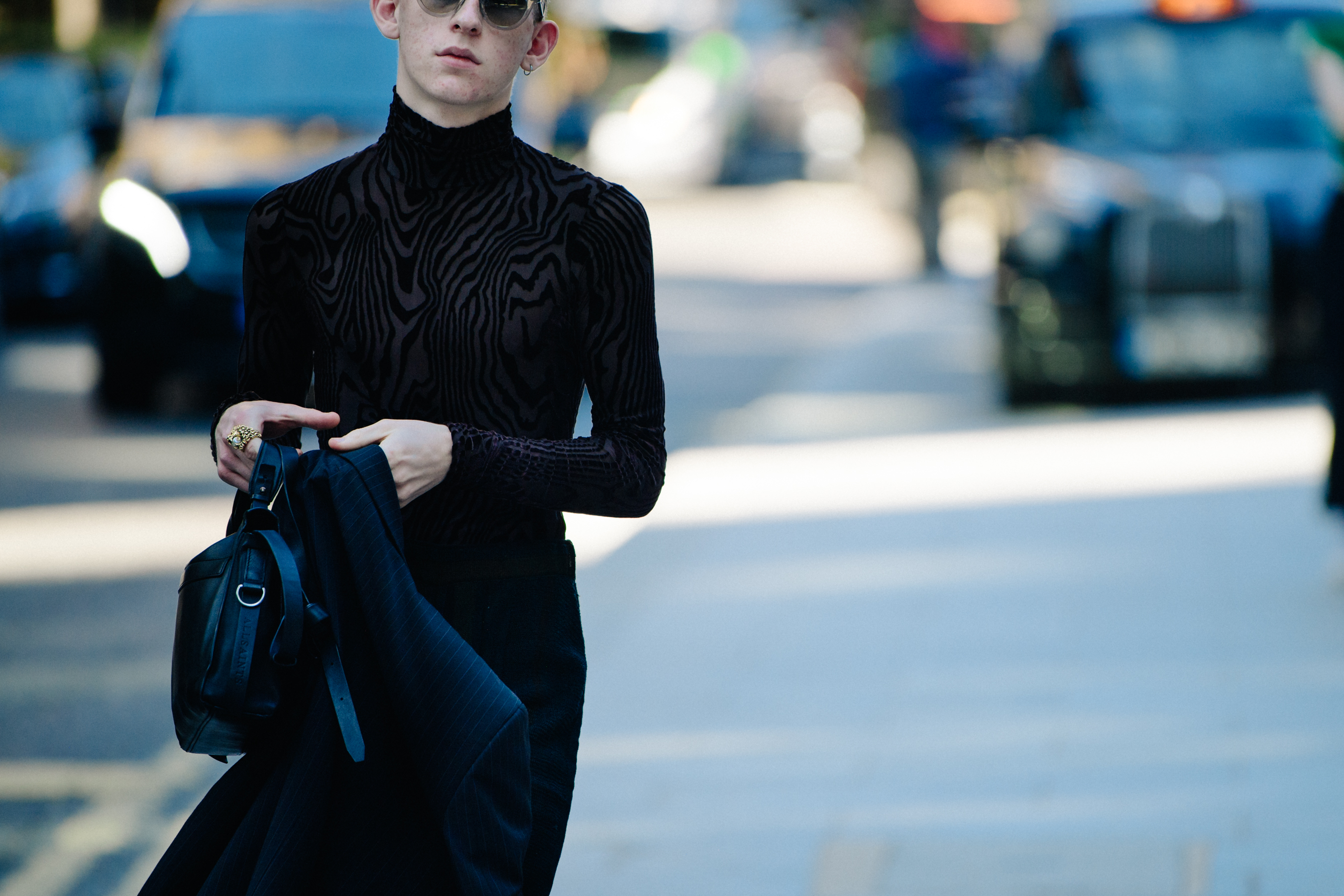 Man wearing lace top