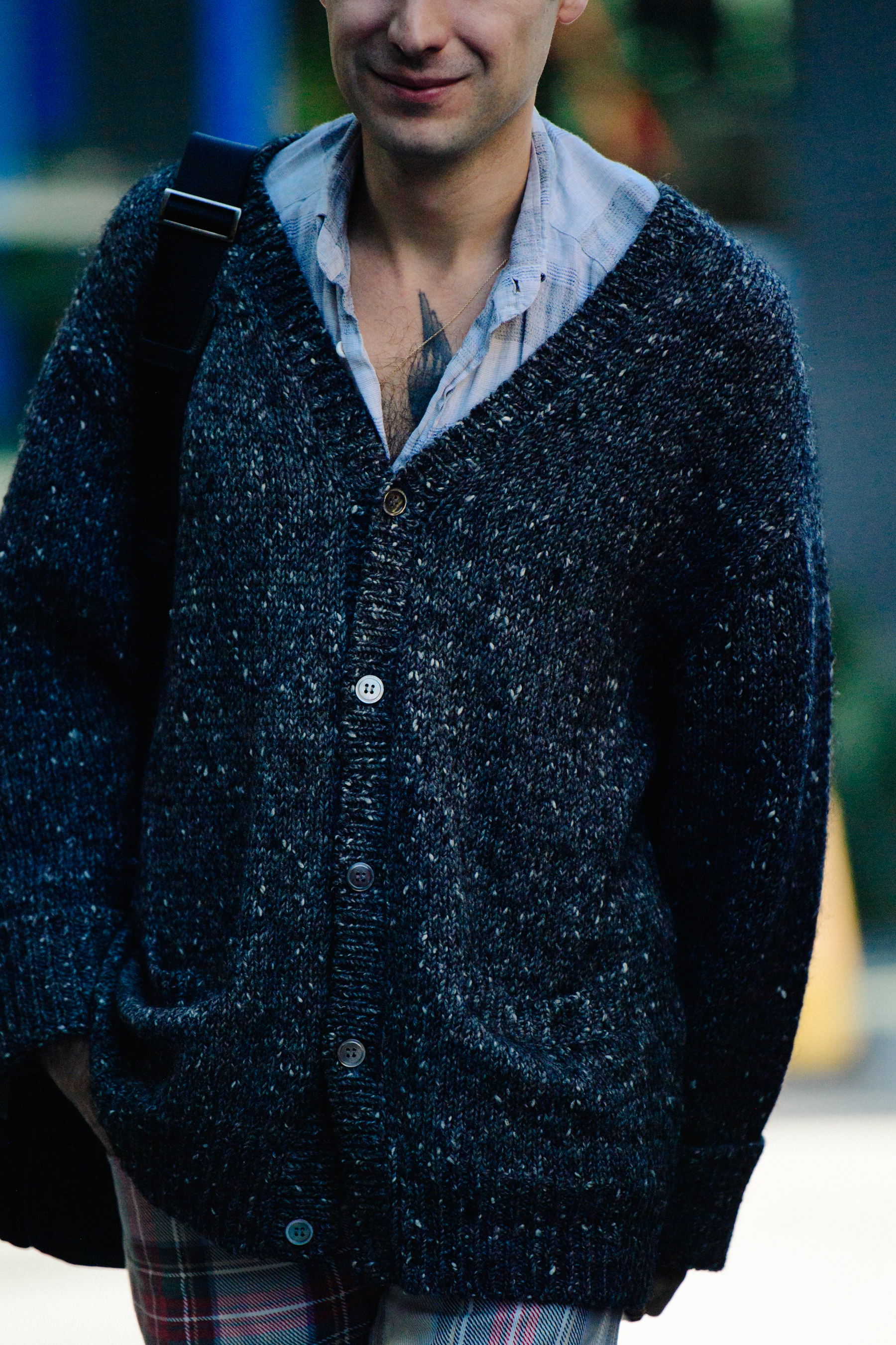 Man wearing grey jumper