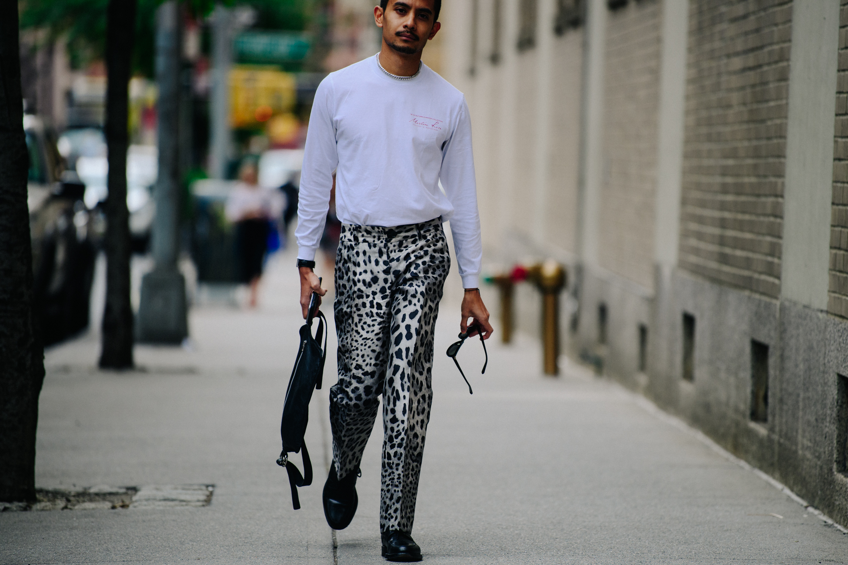 Man wearing snow leopard print pants