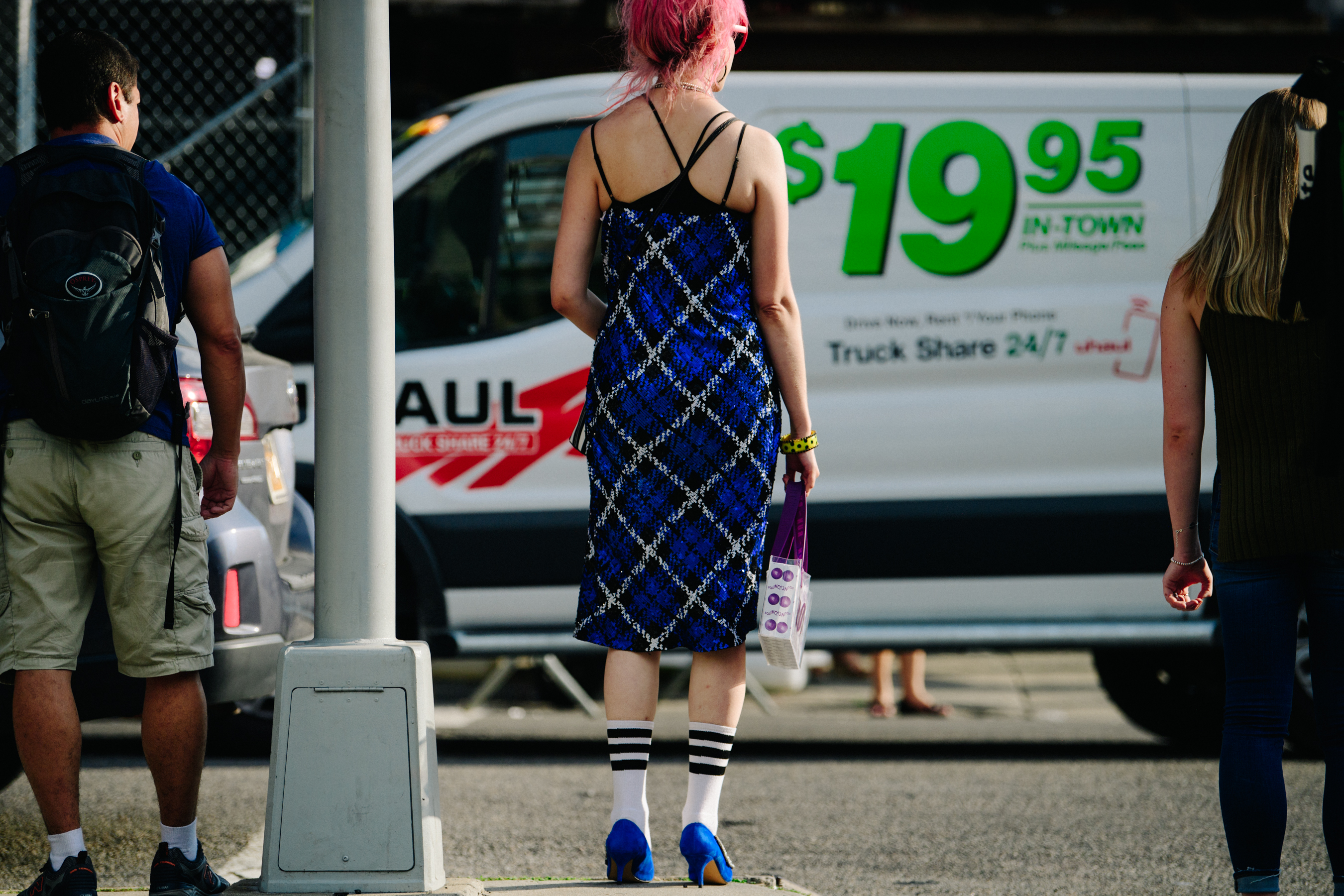 Woman wearing blue check dress