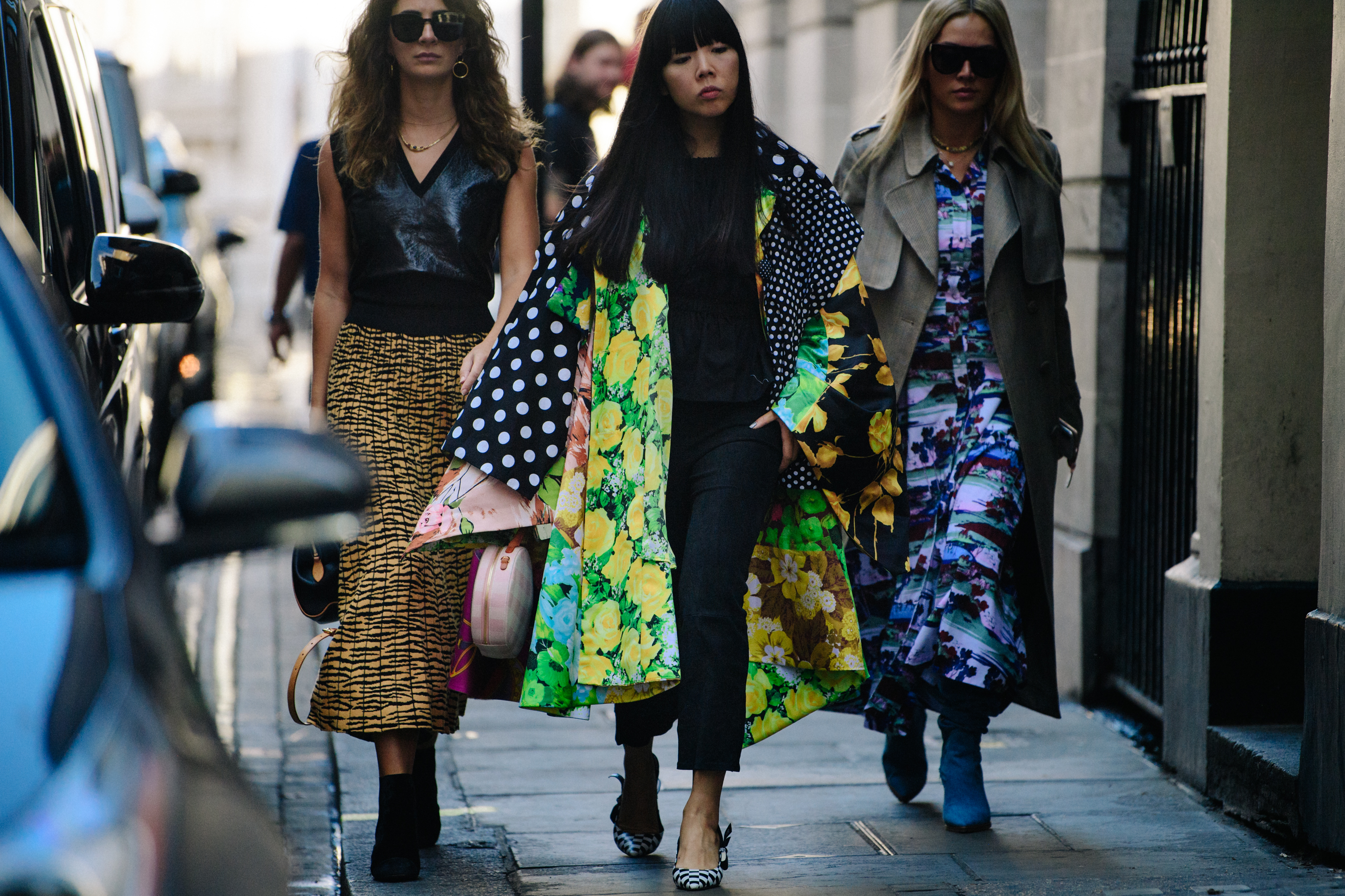 Asian woman wearing floral coat