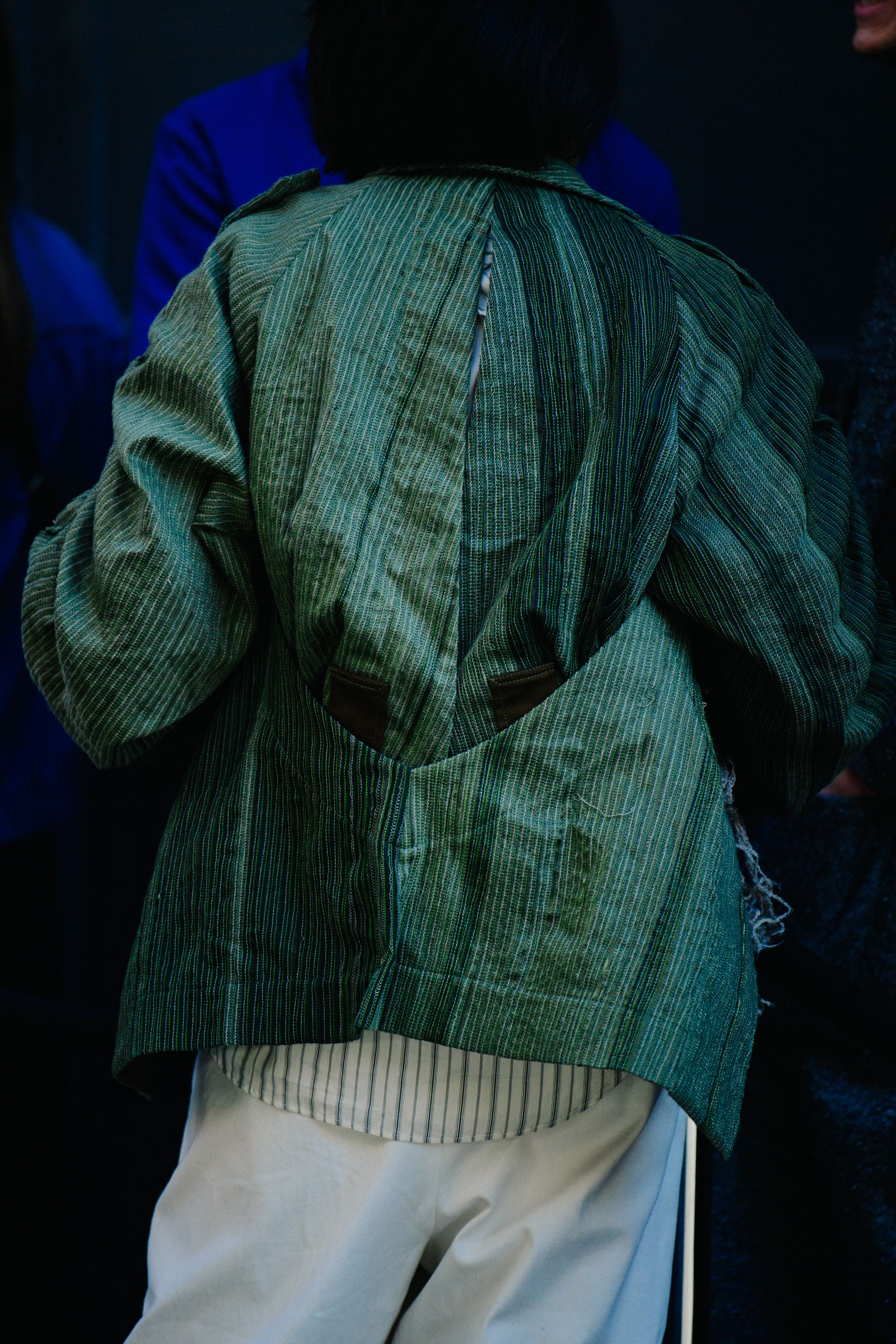 Man wearing green jacket