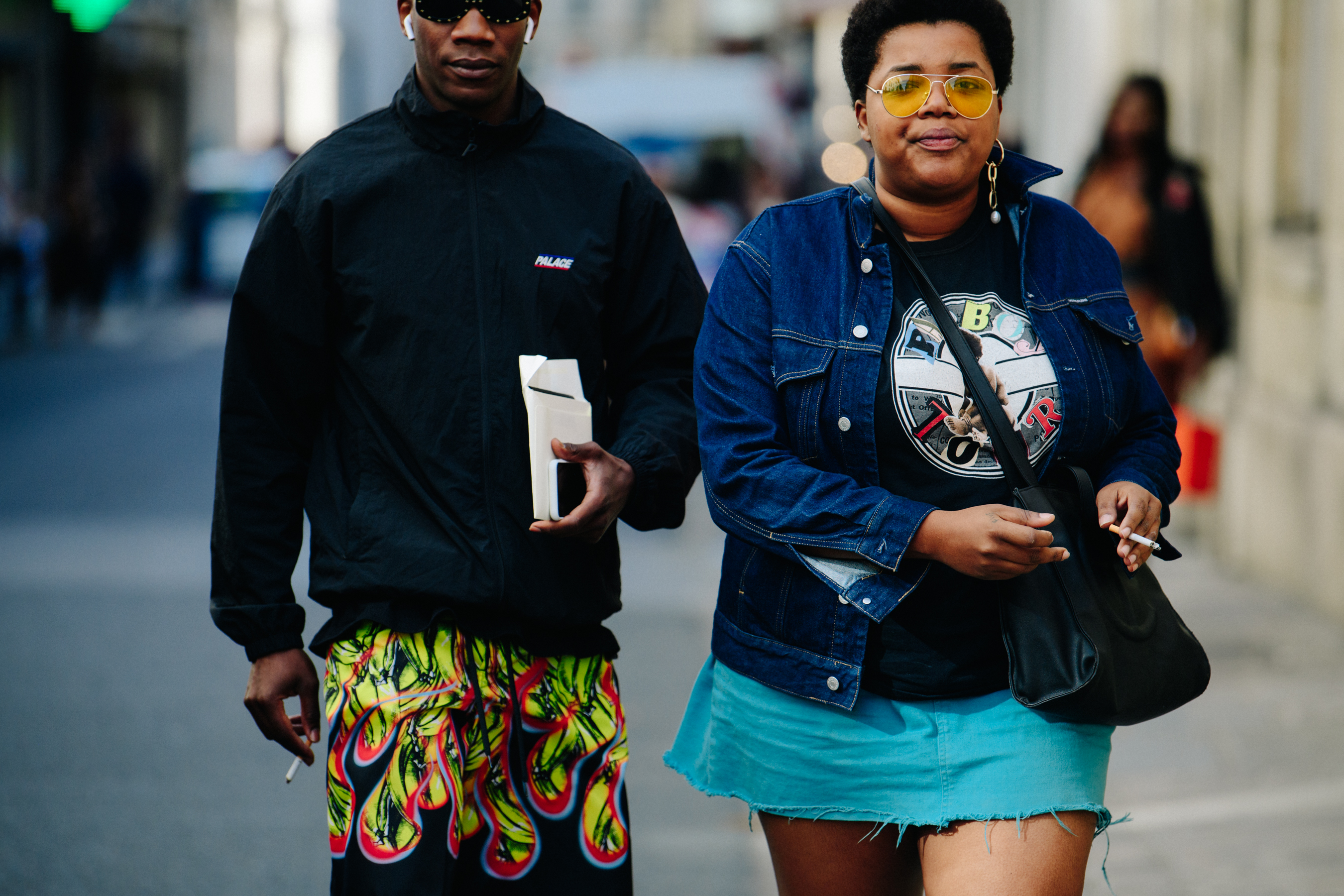 Couple wearing dark outfits