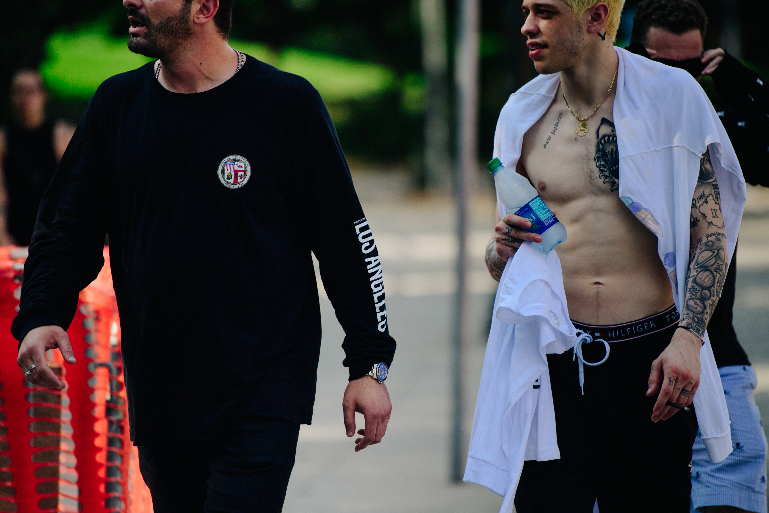 Two men wearing black and white