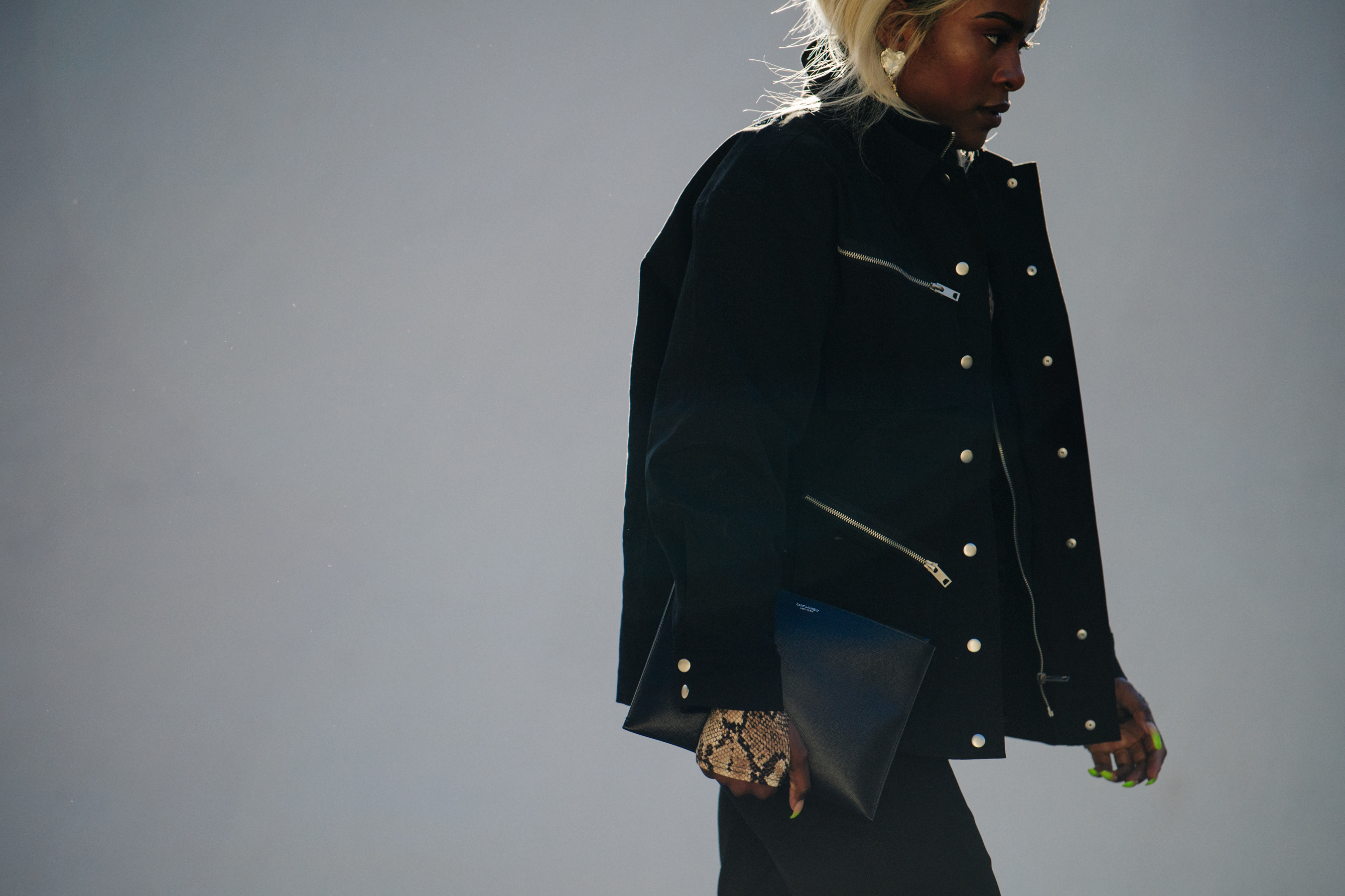 Woman wearing black button up jacket