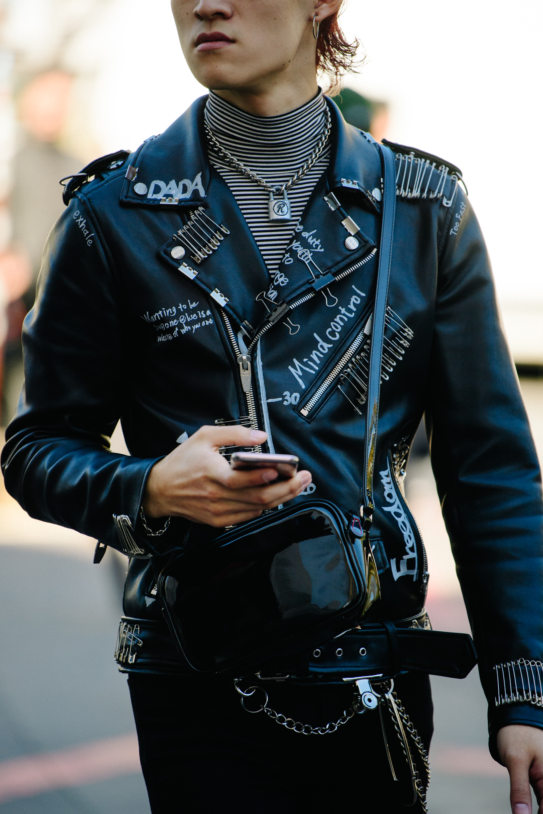 Man wearing black leather jacket